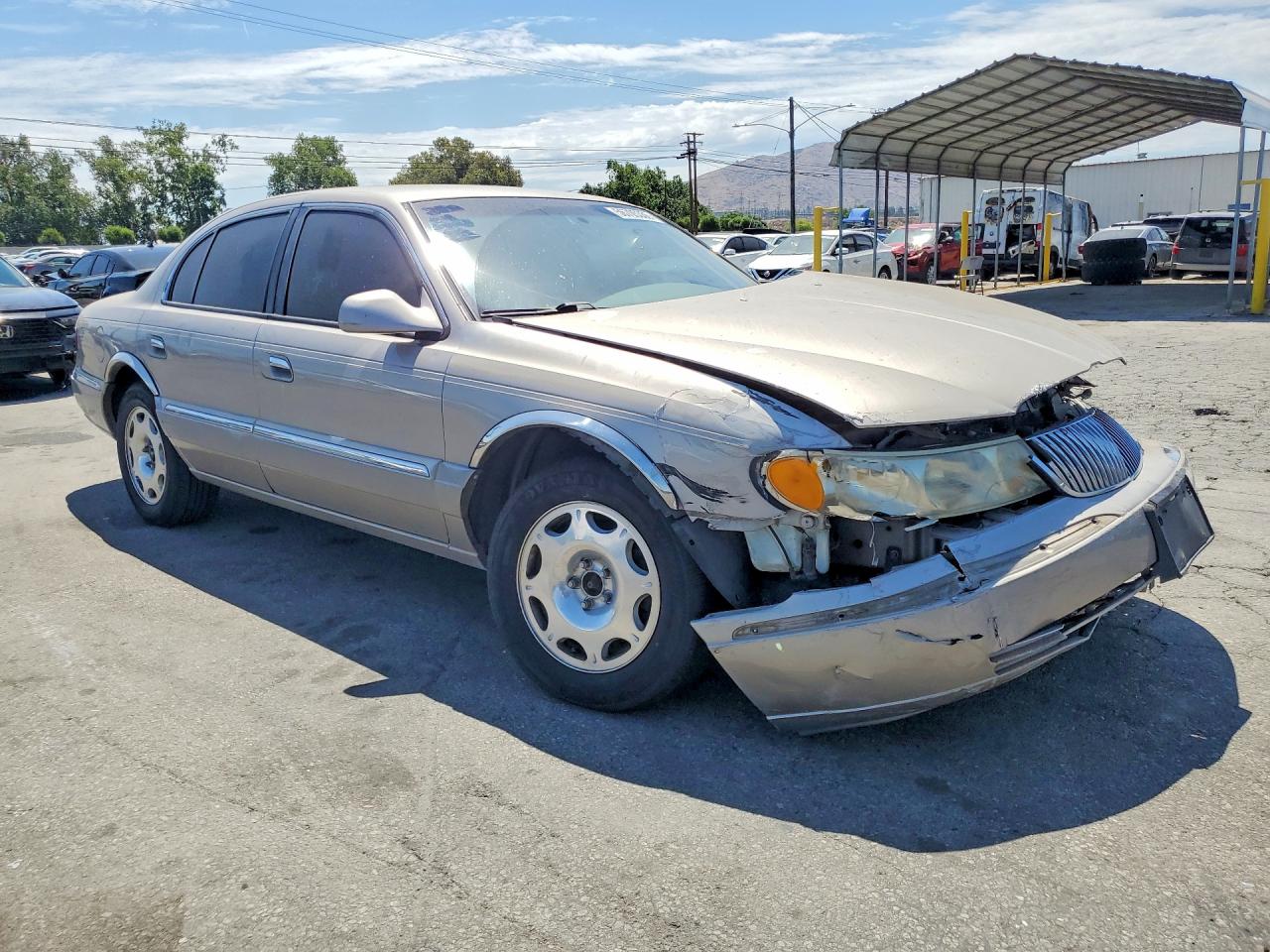 2000 Lincoln Continental Beige vin: 1LNHM97V8YY829940
