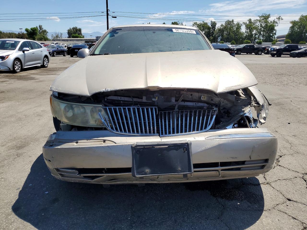 2000 Lincoln Continental Beige vin: 1LNHM97V8YY829940