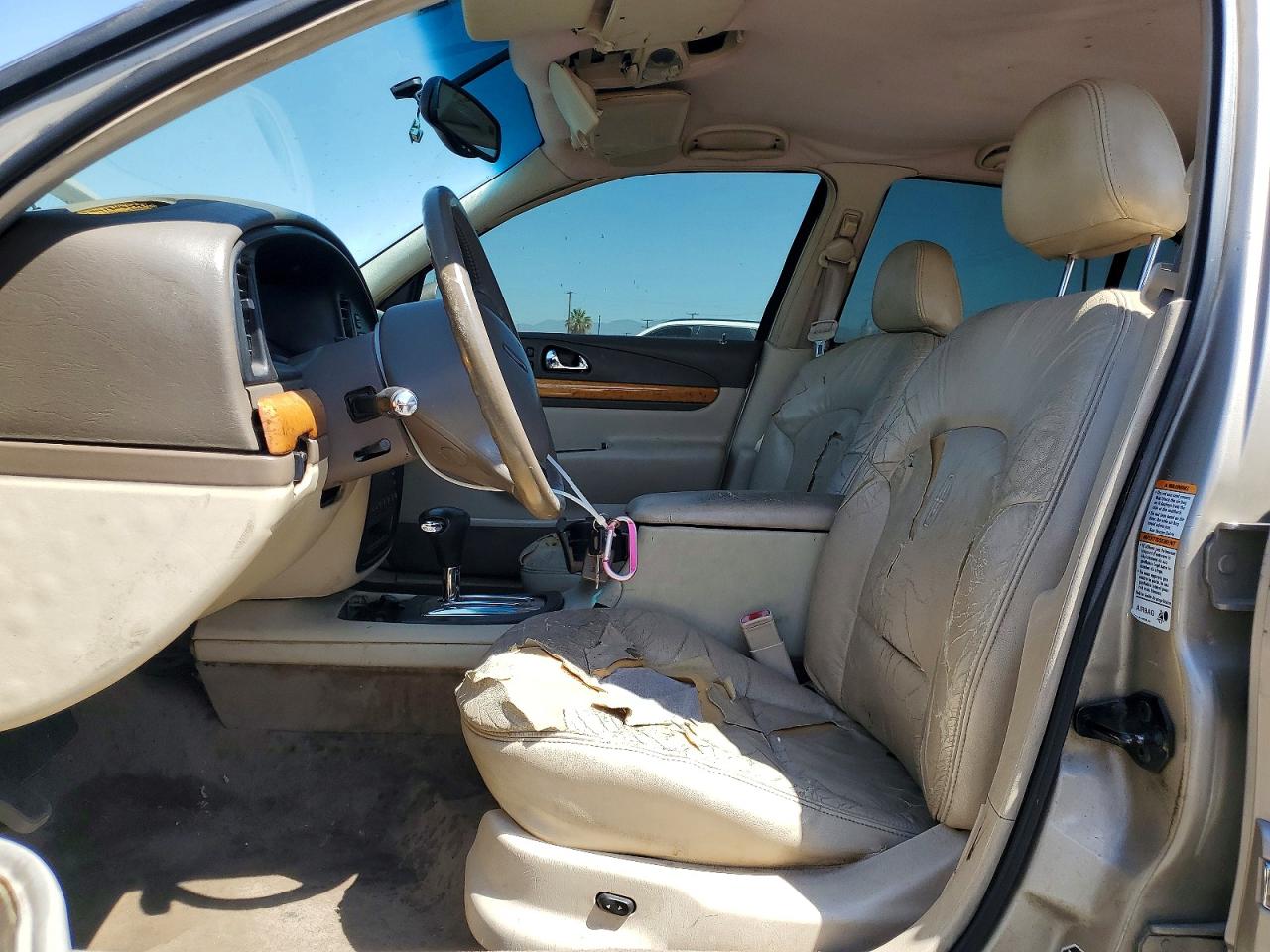 2000 Lincoln Continental Beige vin: 1LNHM97V8YY829940