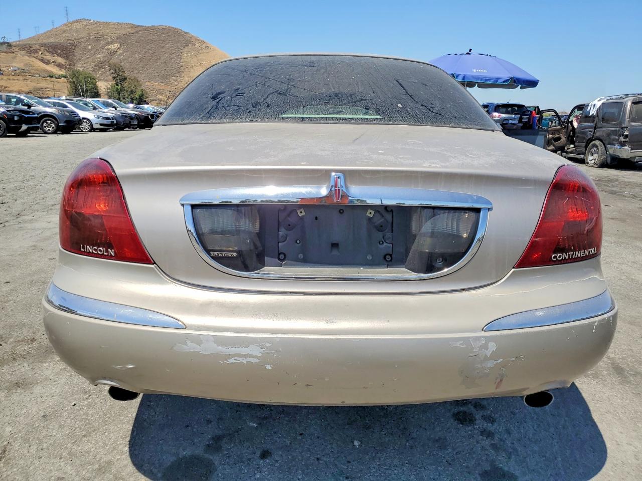 2000 Lincoln Continental Beige vin: 1LNHM97V8YY829940