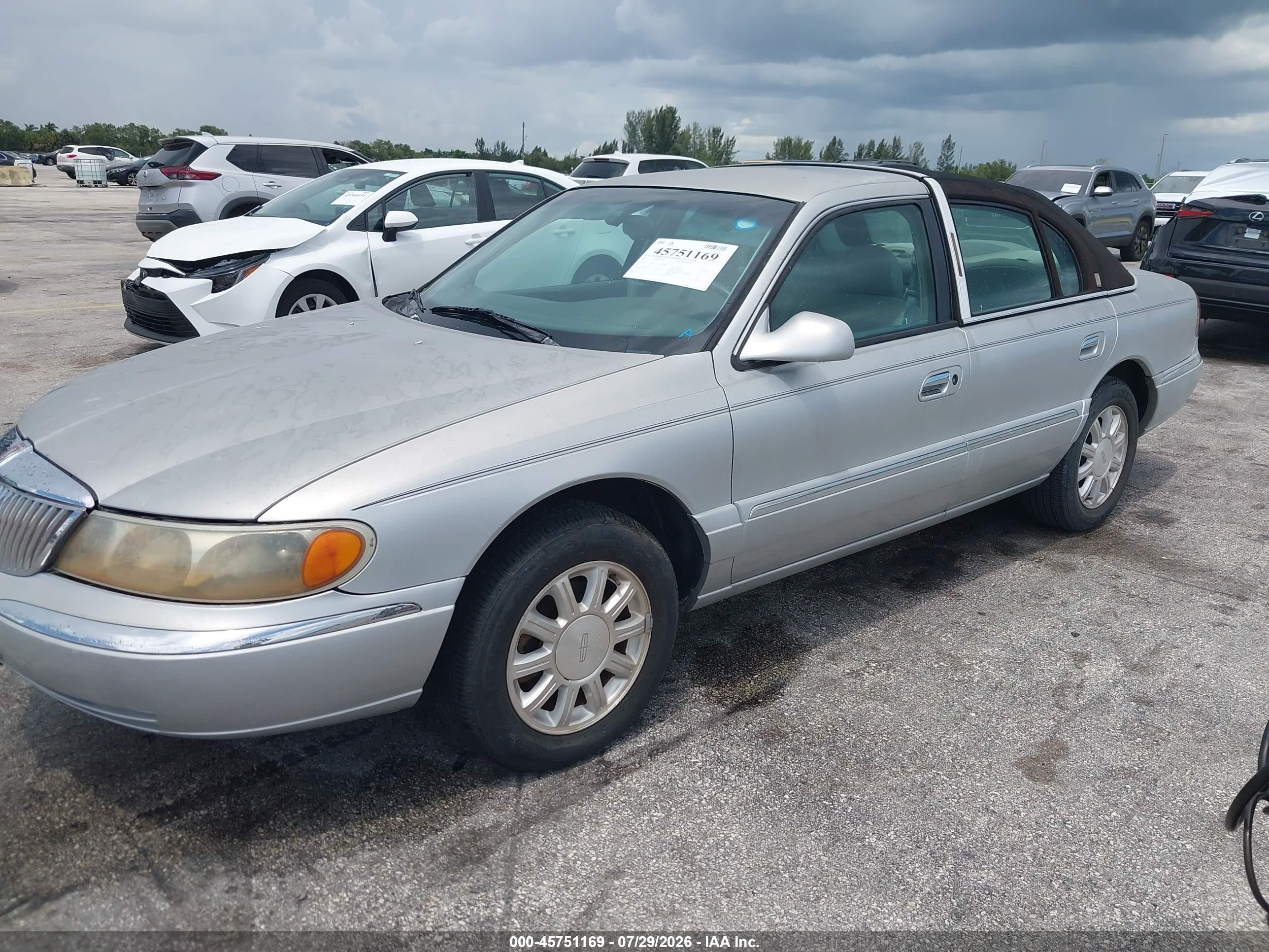 2001 Lincoln Continental   Silver vin: 1LNHM97V91Y649260