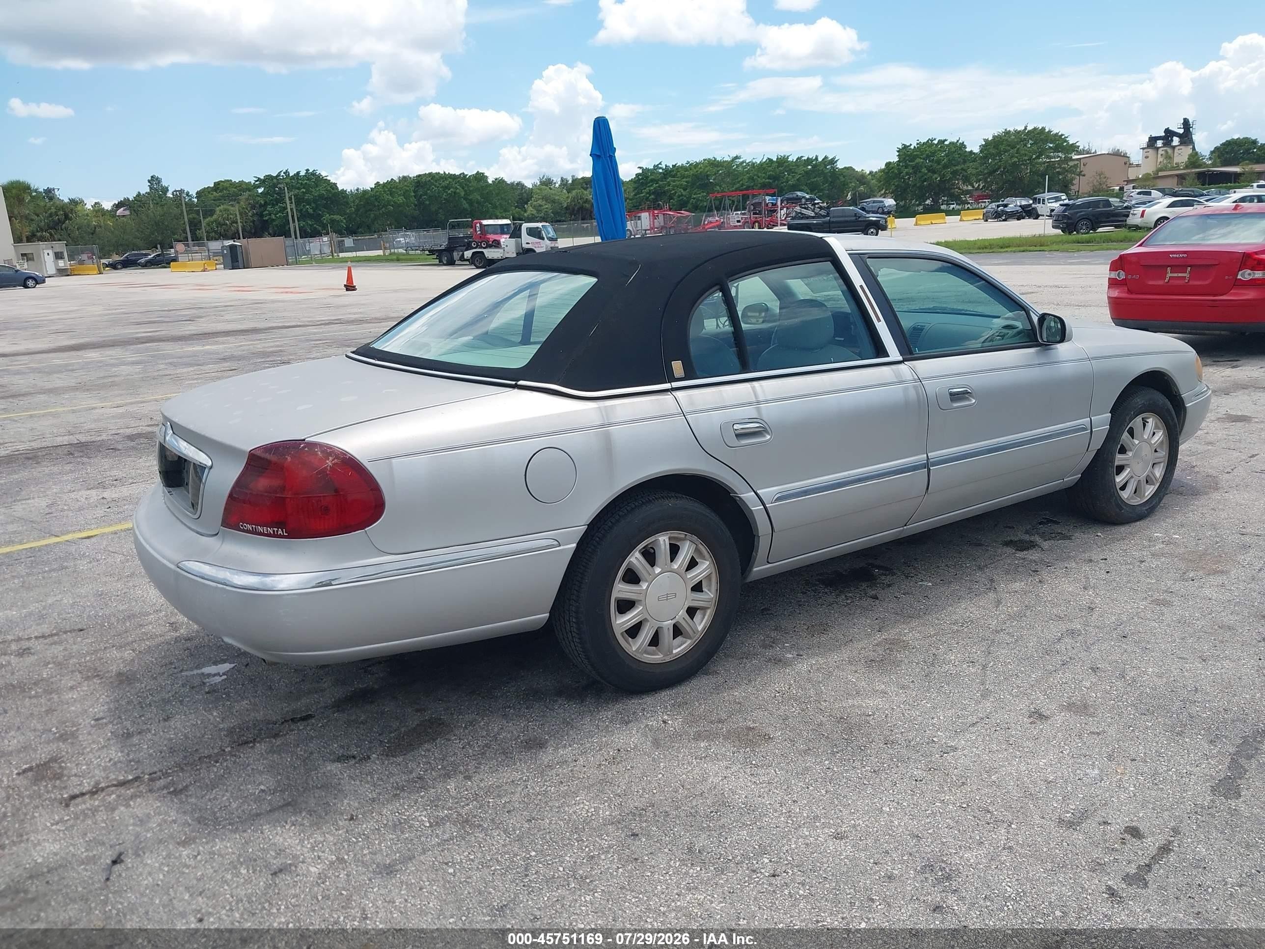 2001 Lincoln Continental   Silver vin: 1LNHM97V91Y649260