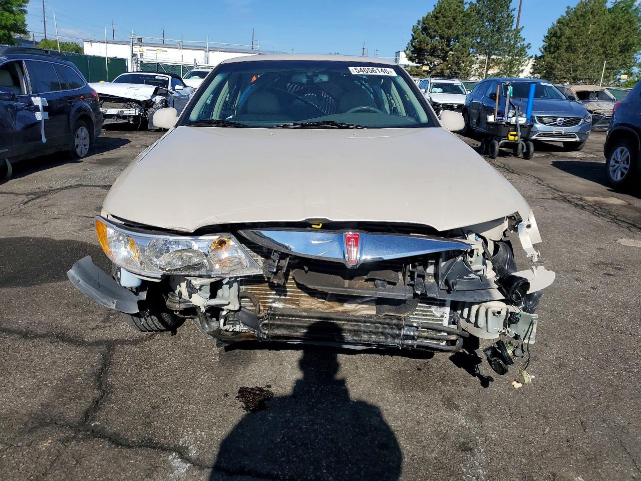 2002 Lincoln Continental Cream vin: 1LNHM97V92Y600531