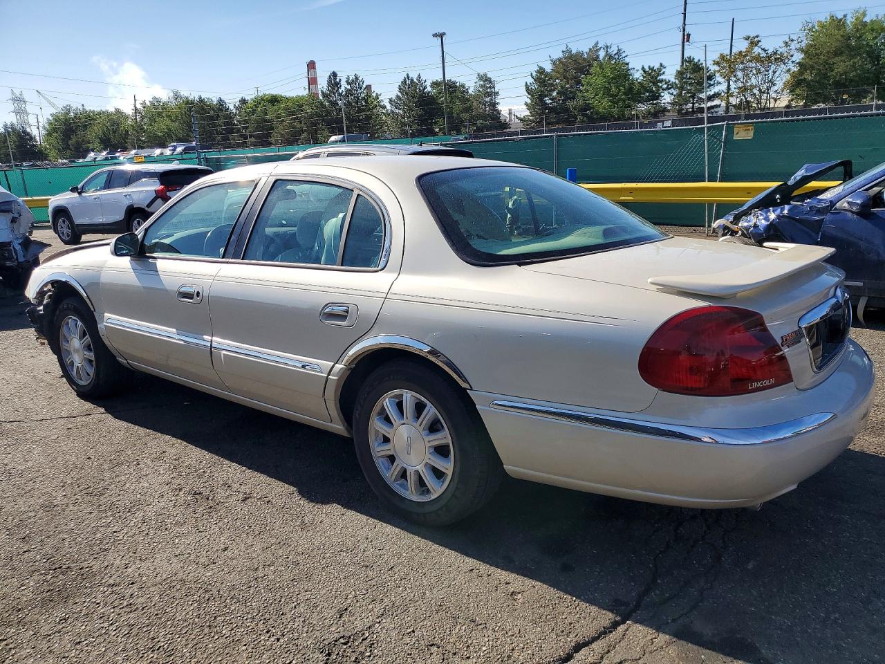 2002 Lincoln Continental Cream vin: 1LNHM97V92Y600531