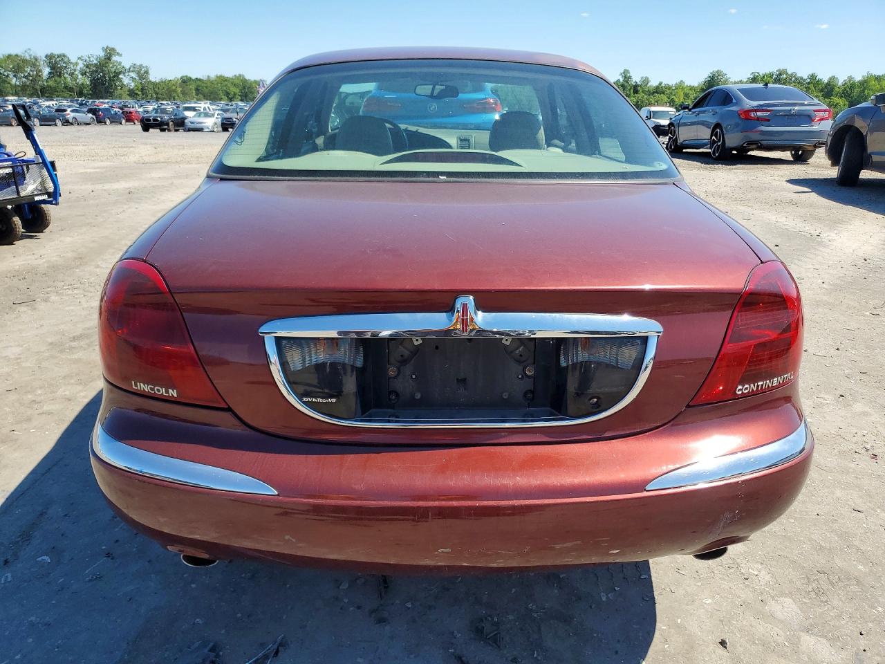 2002 Lincoln Continental Burgundy vin: 1LNHM97V92Y624148