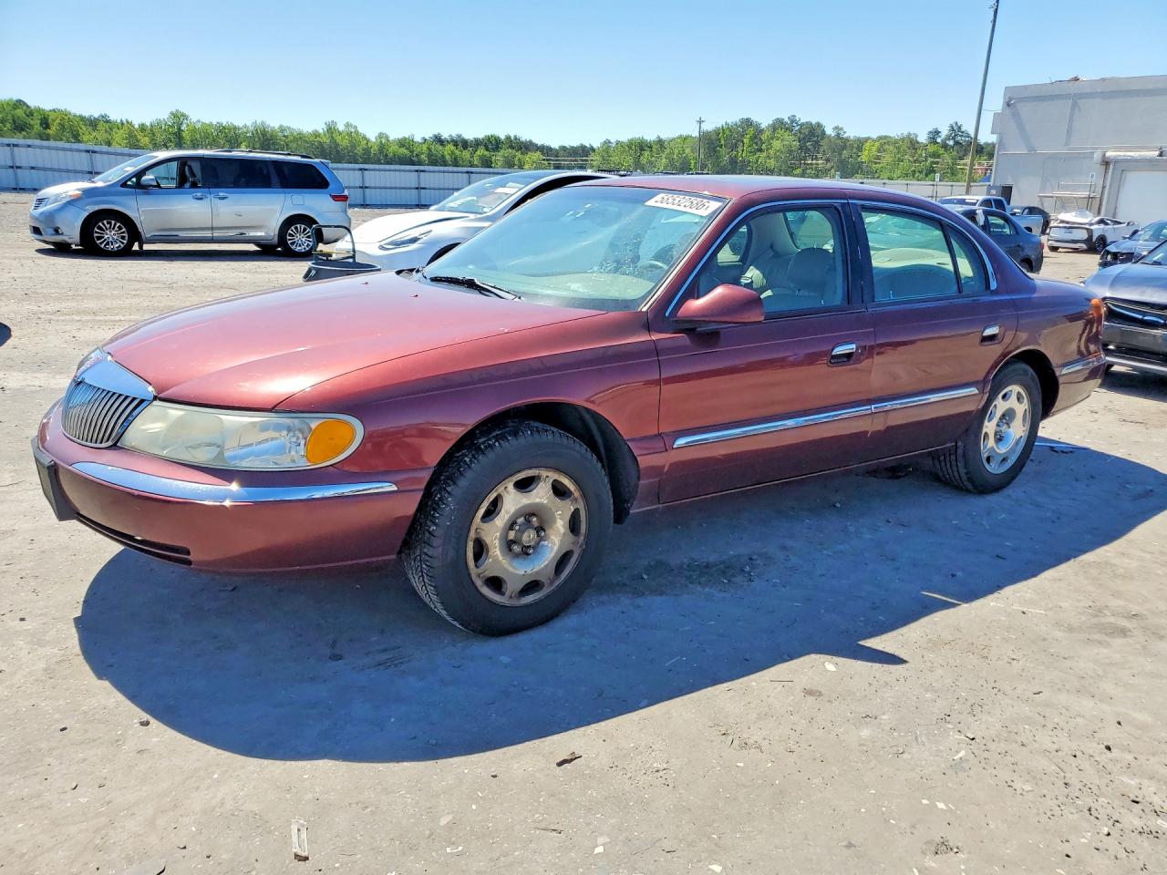 2002 Lincoln Continental Burgundy vin: 1LNHM97V92Y624148