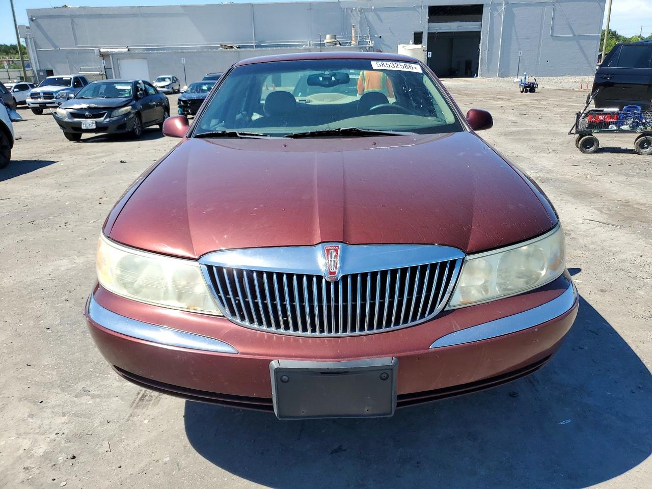 2002 Lincoln Continental Burgundy vin: 1LNHM97V92Y624148