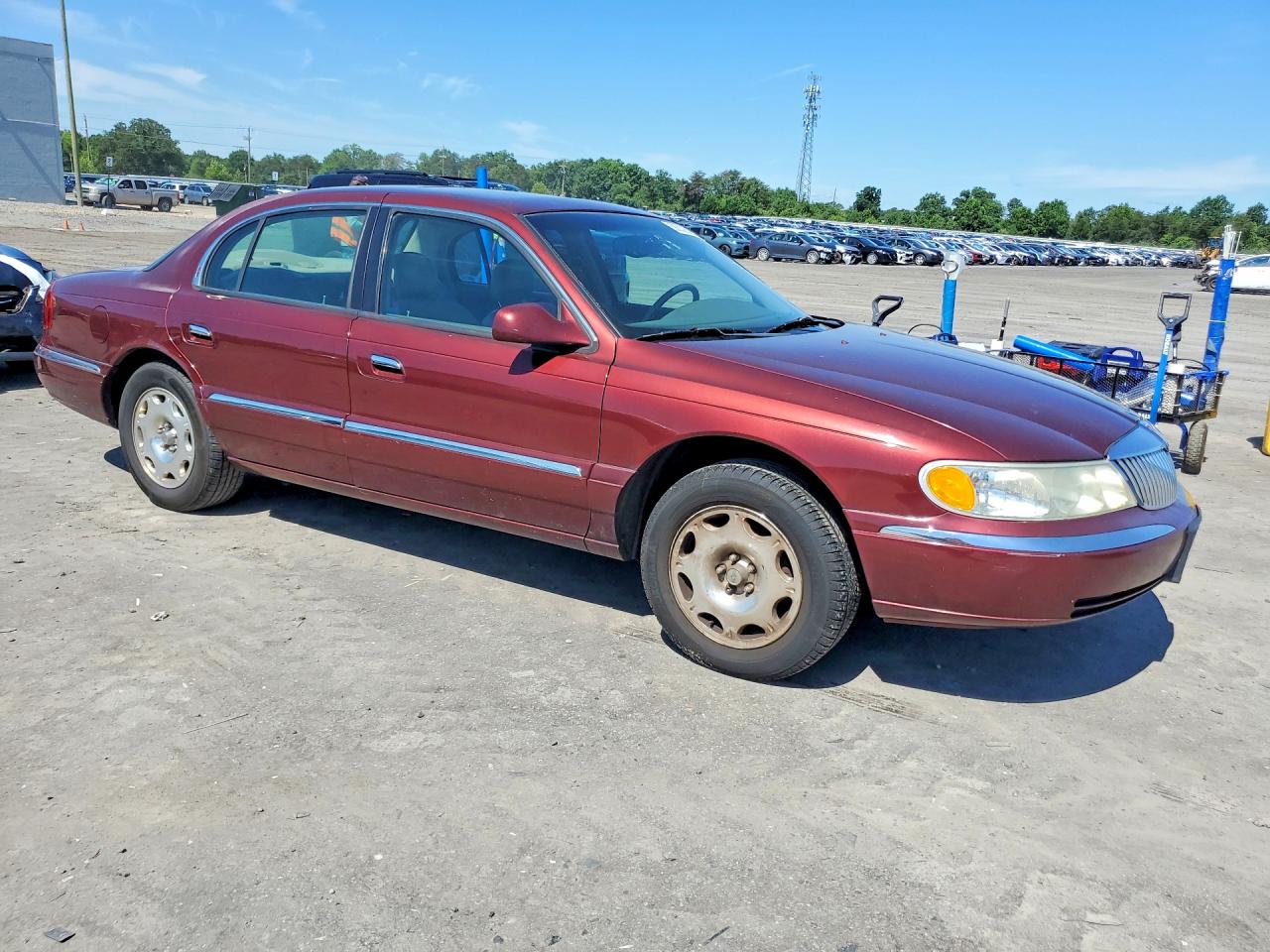 2002 Lincoln Continental Burgundy vin: 1LNHM97V92Y624148