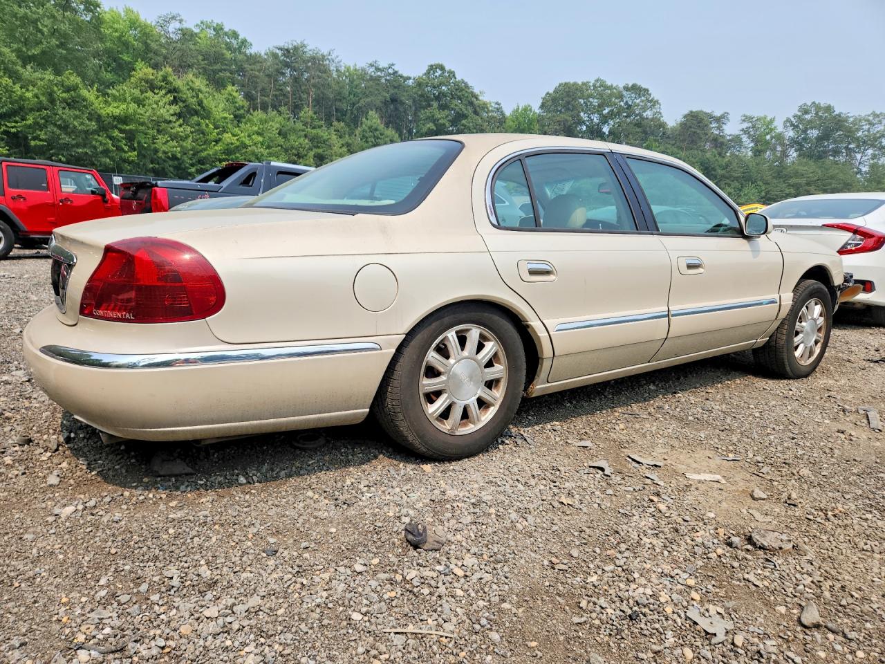 2002 Lincoln Continental Beige vin: 1LNHM97V92Y691963