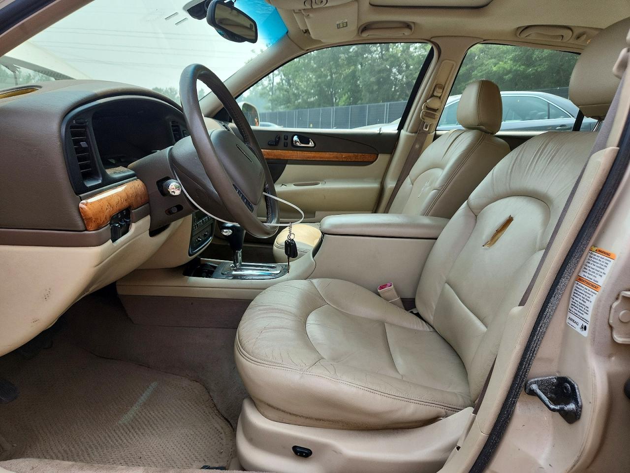 2002 Lincoln Continental Beige vin: 1LNHM97V92Y691963
