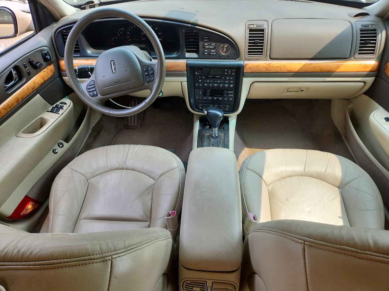 2002 Lincoln Continental Beige vin: 1LNHM97V92Y691963