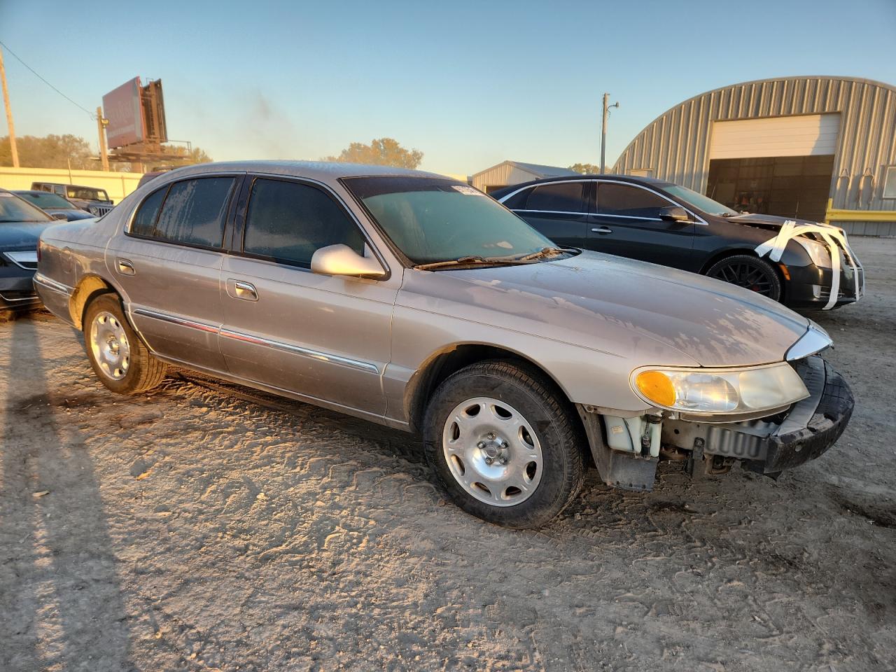 1999 Lincoln Continental Silver vin: 1LNHM97V9XY626635