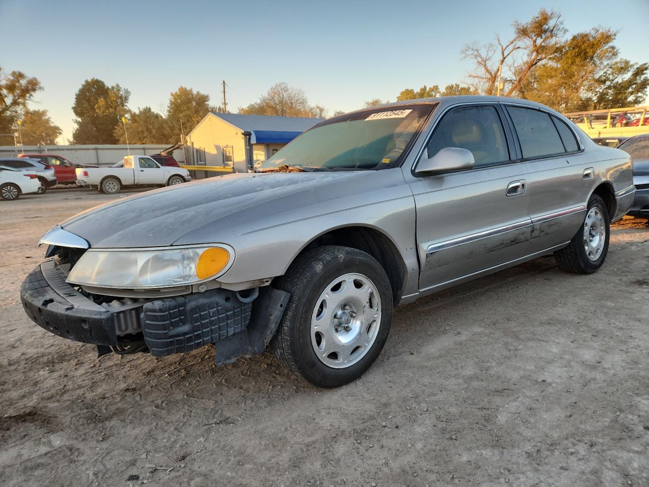1999 Lincoln Continental Silver vin: 1LNHM97V9XY626635