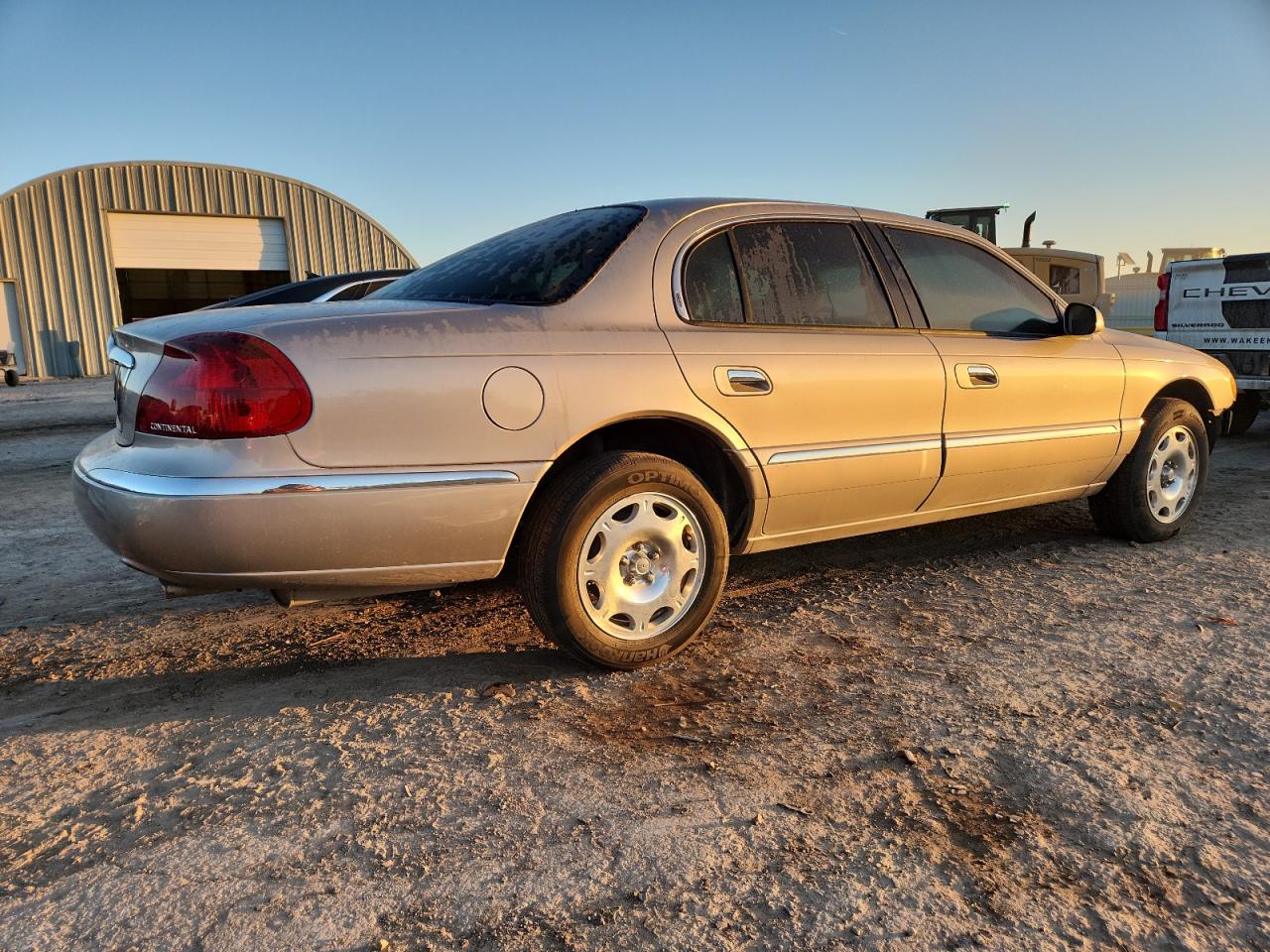 1999 Lincoln Continental Silver vin: 1LNHM97V9XY626635