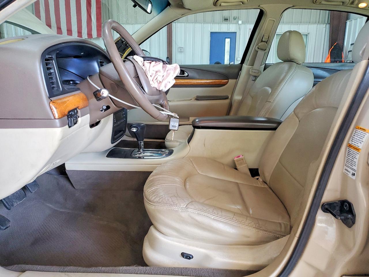 1999 Lincoln Continental Cream vin: 1LNHM97V9XY667458