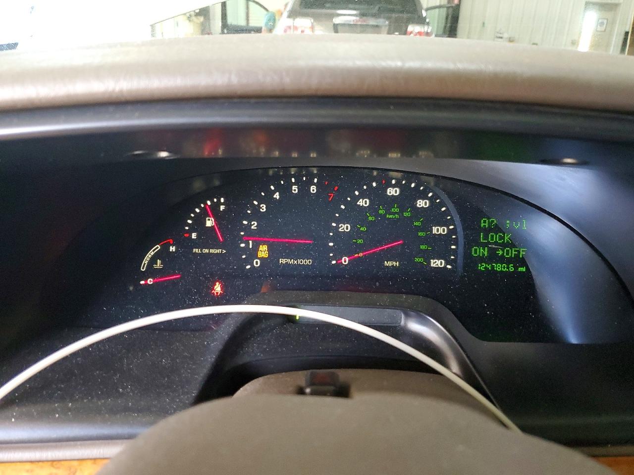 1999 Lincoln Continental Cream vin: 1LNHM97V9XY667458