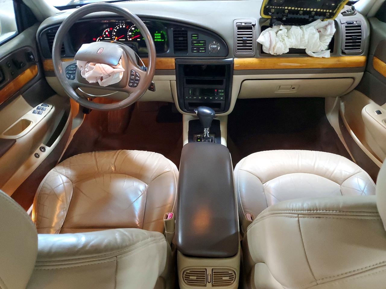 1999 Lincoln Continental Cream vin: 1LNHM97V9XY667458