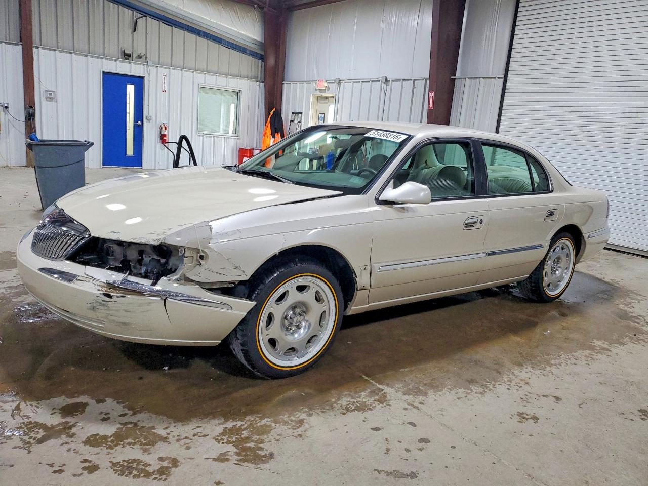 1999 Lincoln Continental Cream vin: 1LNHM97V9XY667458
