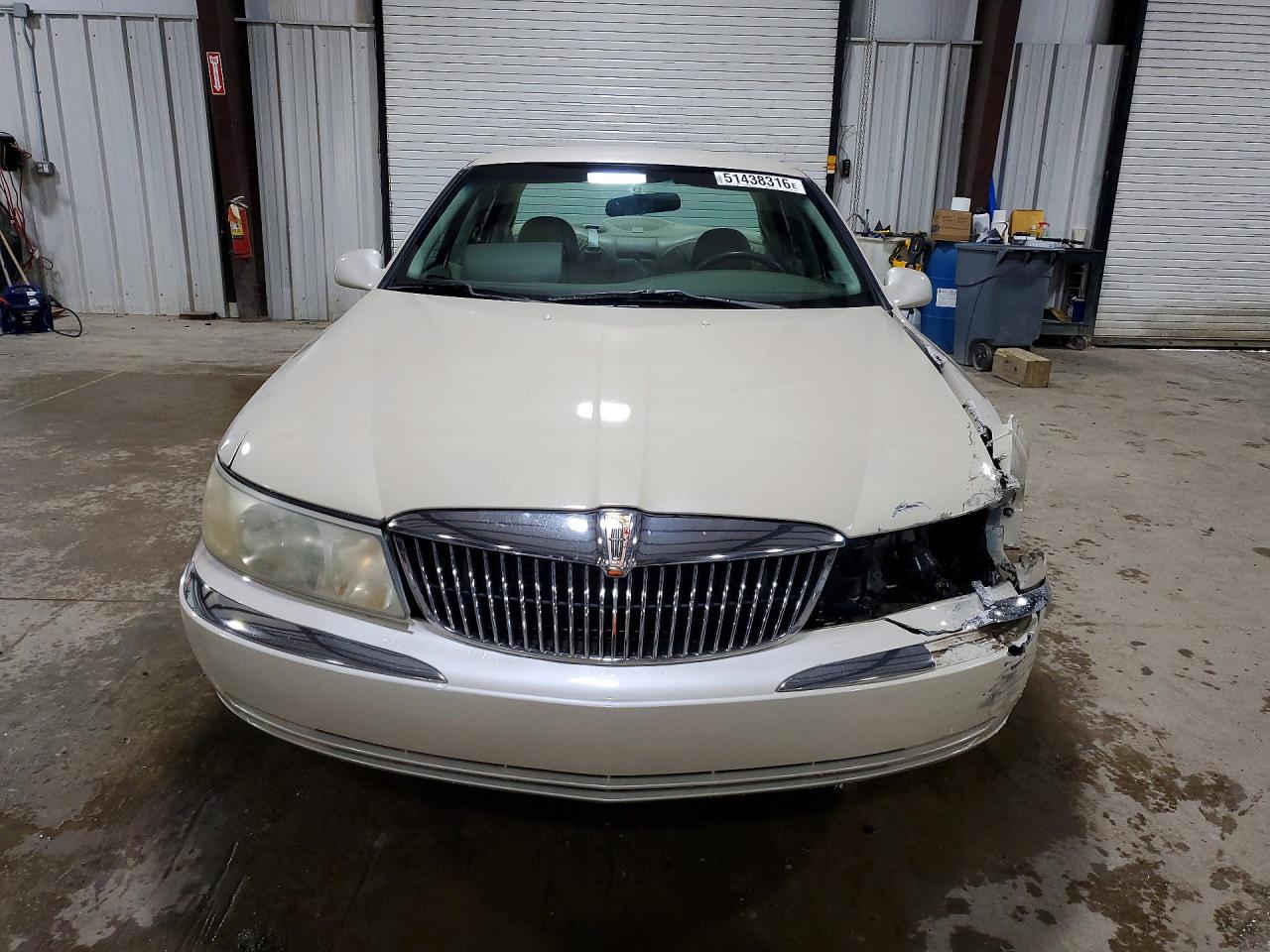1999 Lincoln Continental Cream vin: 1LNHM97V9XY667458