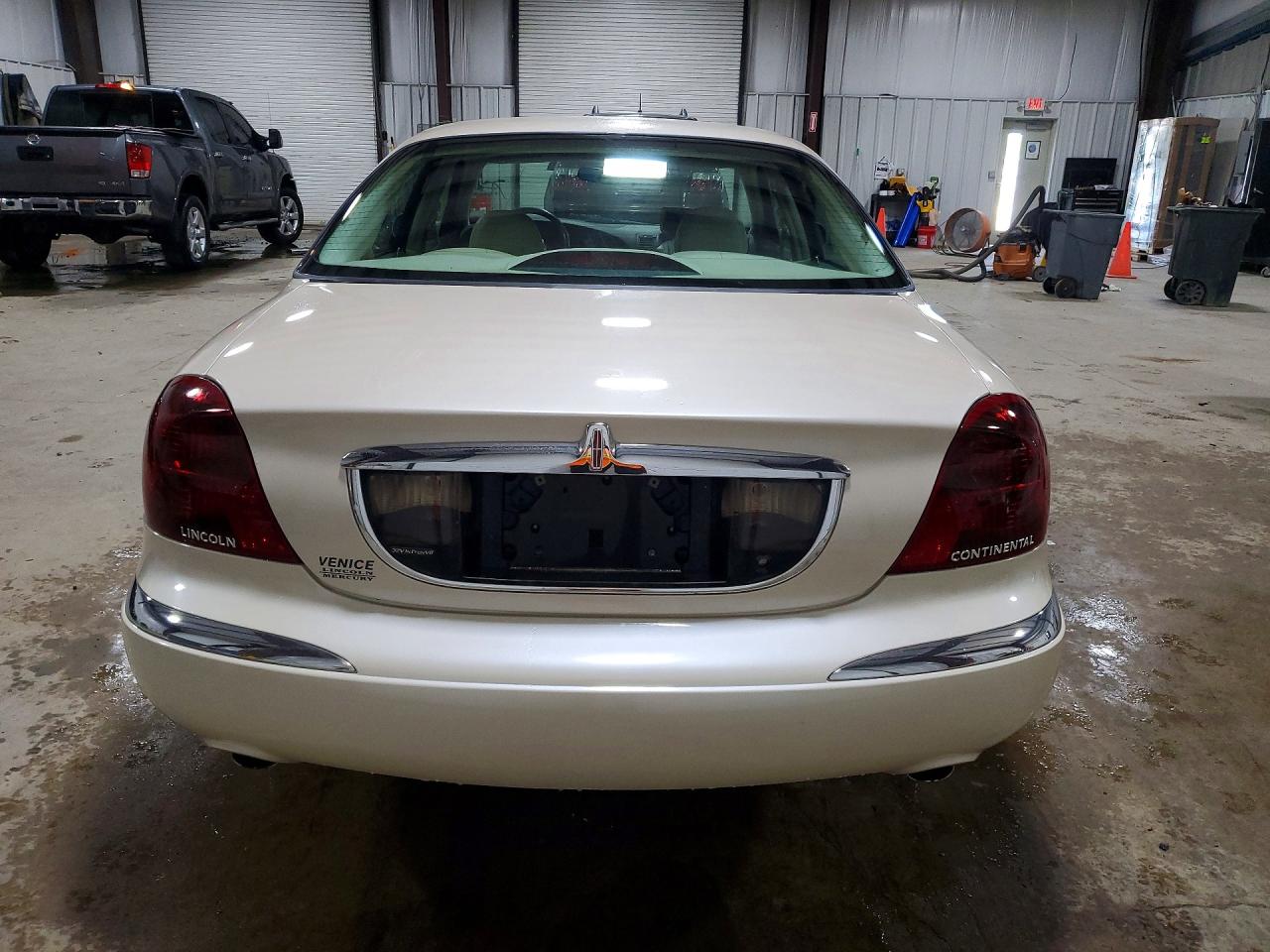 1999 Lincoln Continental Cream vin: 1LNHM97V9XY667458