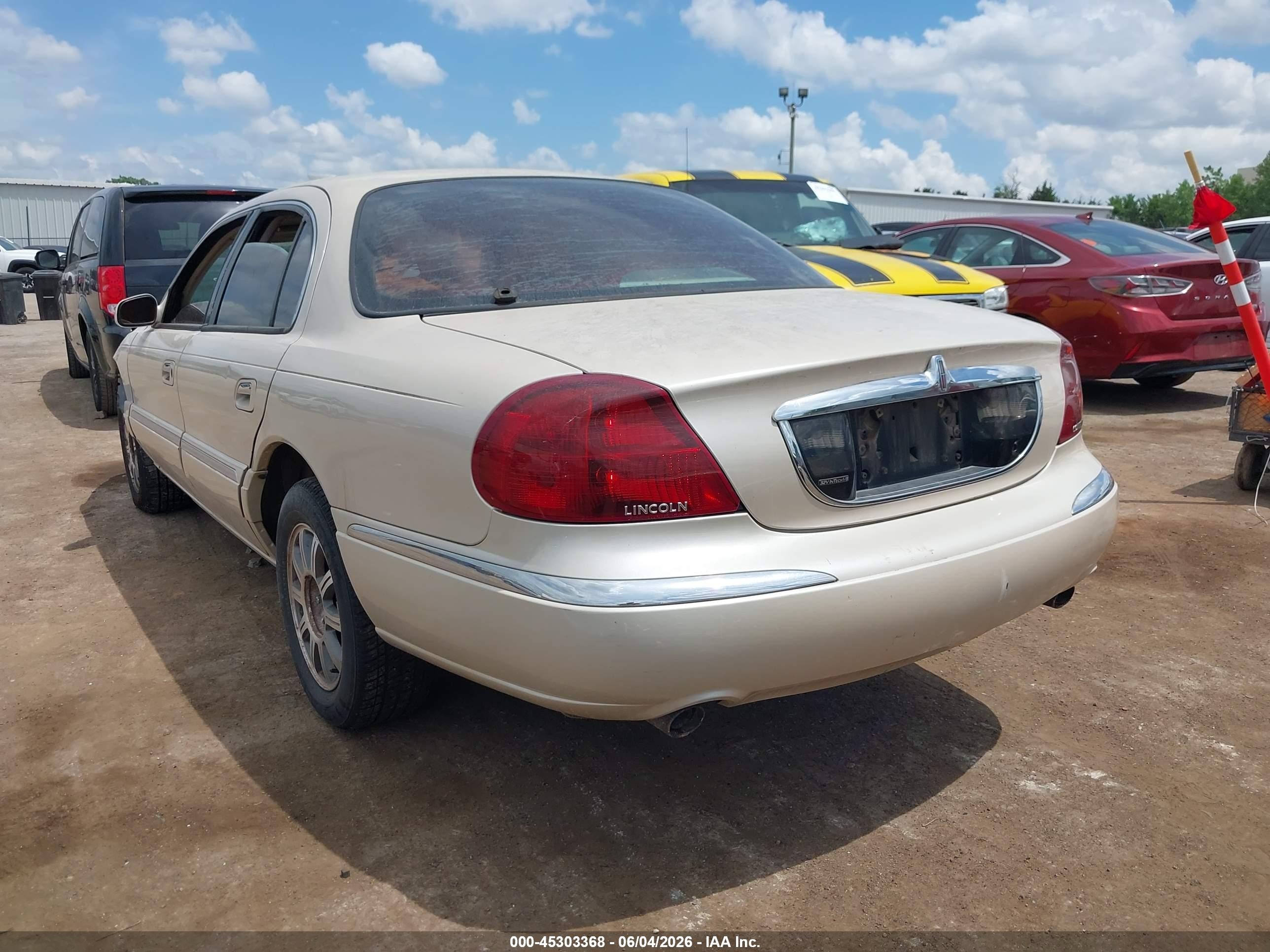 2001 Lincoln Continental   Beige vin: 1LNHM97VX1Y726122