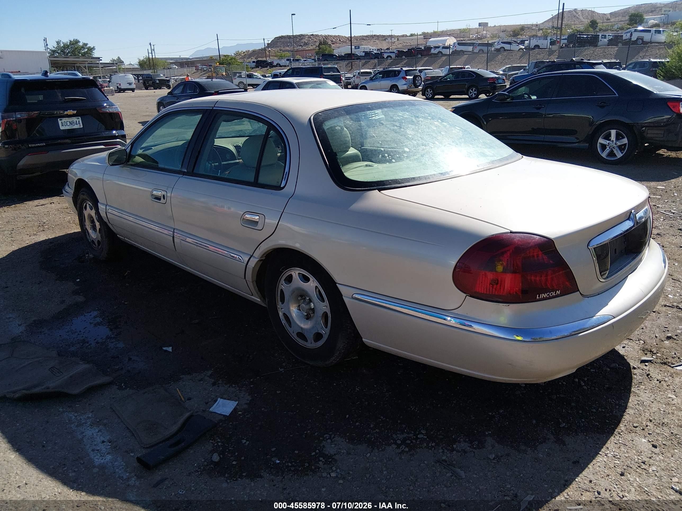 2002 Lincoln Continental   Кремовый vin: 1LNHM97VX2Y695942
