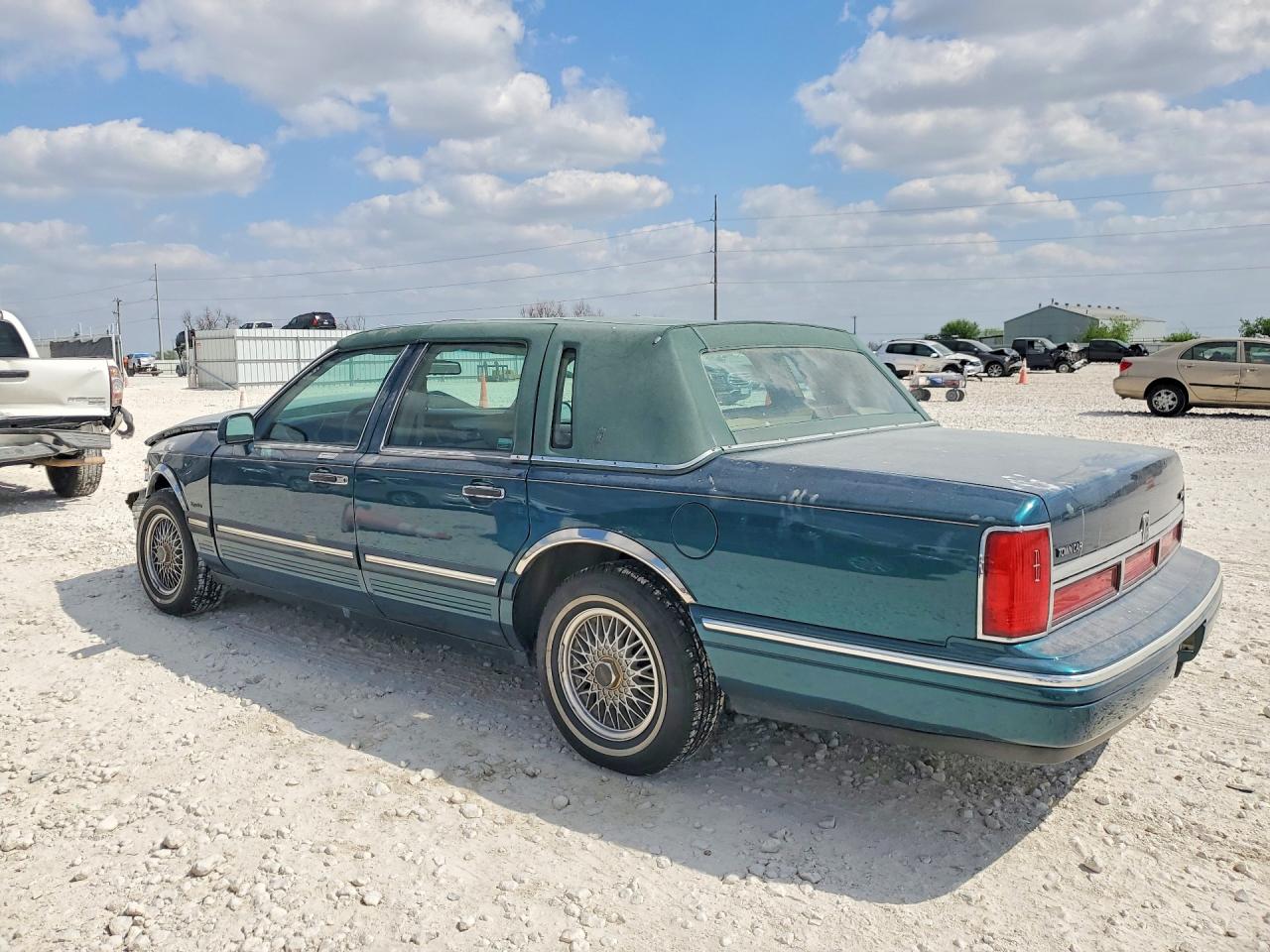 1997 Lincoln Town Car Signature Бирюзовый vin: 1LNLM82W3VY721404