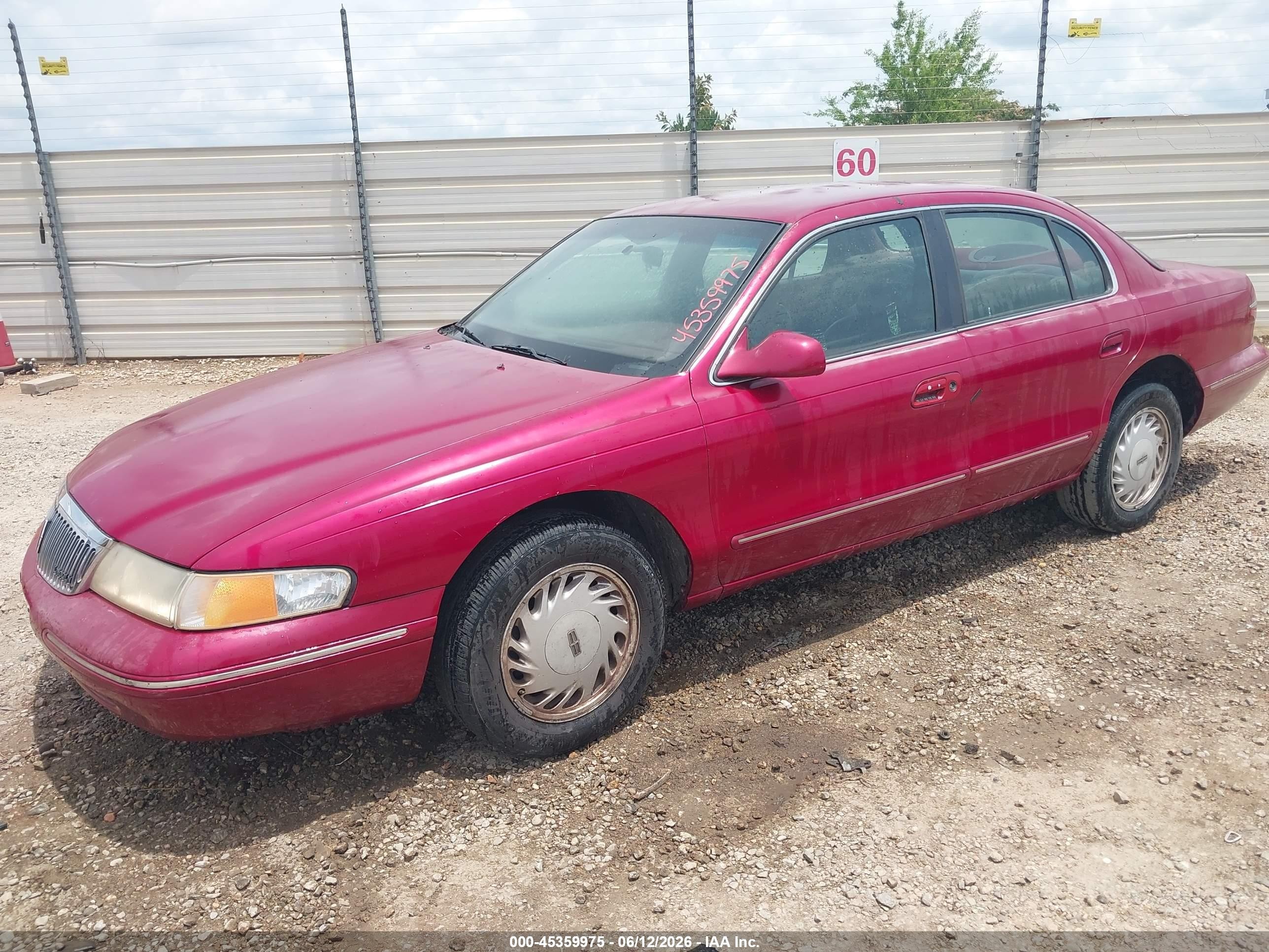 1995 Lincoln Continental   Red vin: 1LNLM97V2SY724568