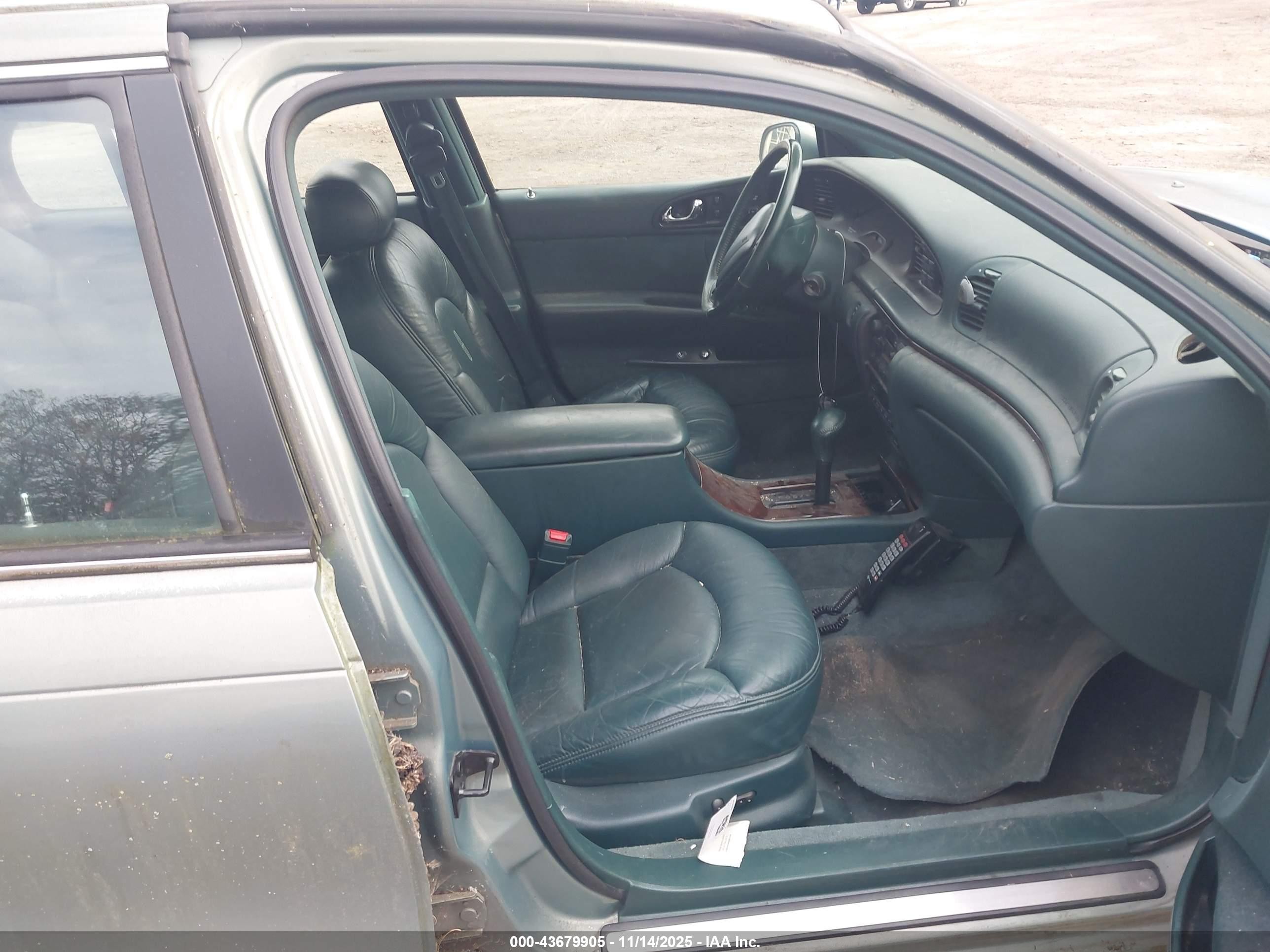 1995 Lincoln Continental   Light Blue vin: 1LNLM97V3SY706547