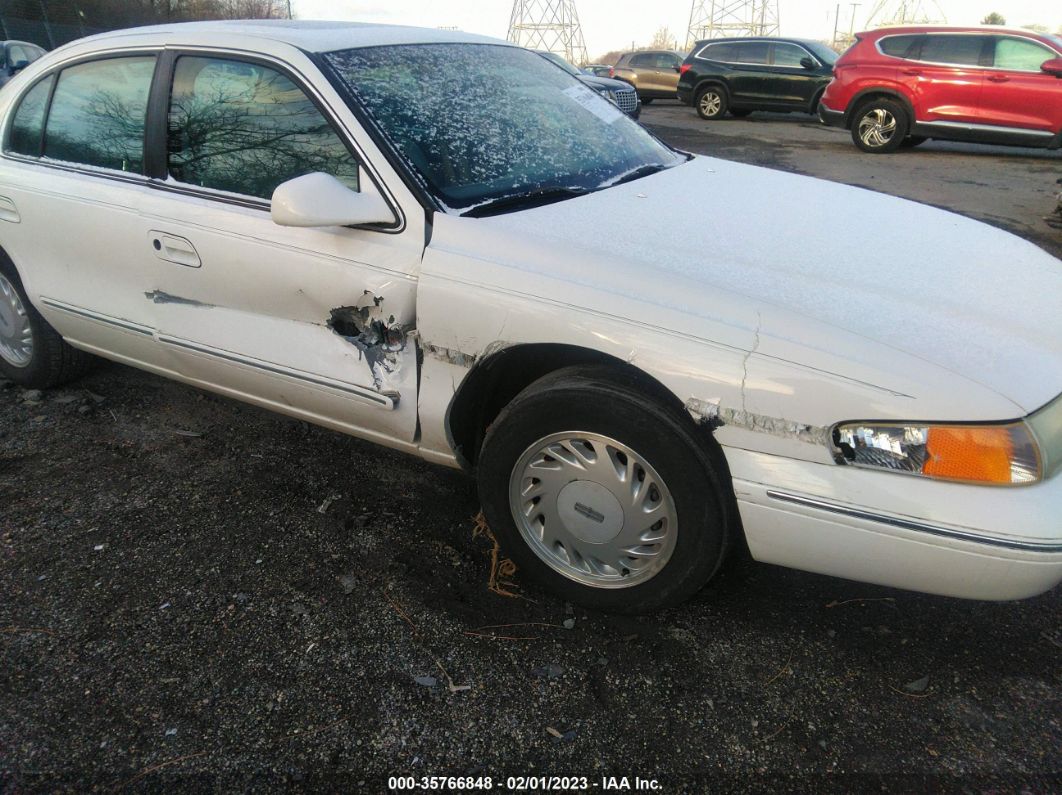 1995 Lincoln Continental   White vin: 1LNLM97V3SY765162