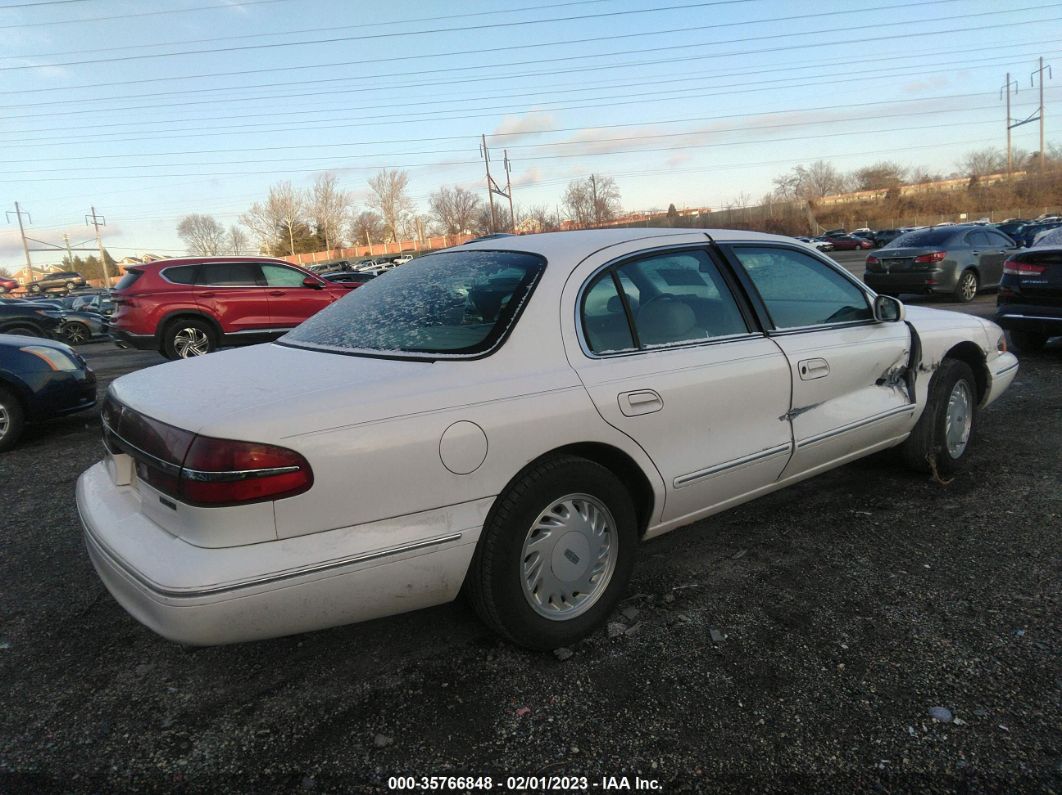 1995 Lincoln Continental   White vin: 1LNLM97V3SY765162