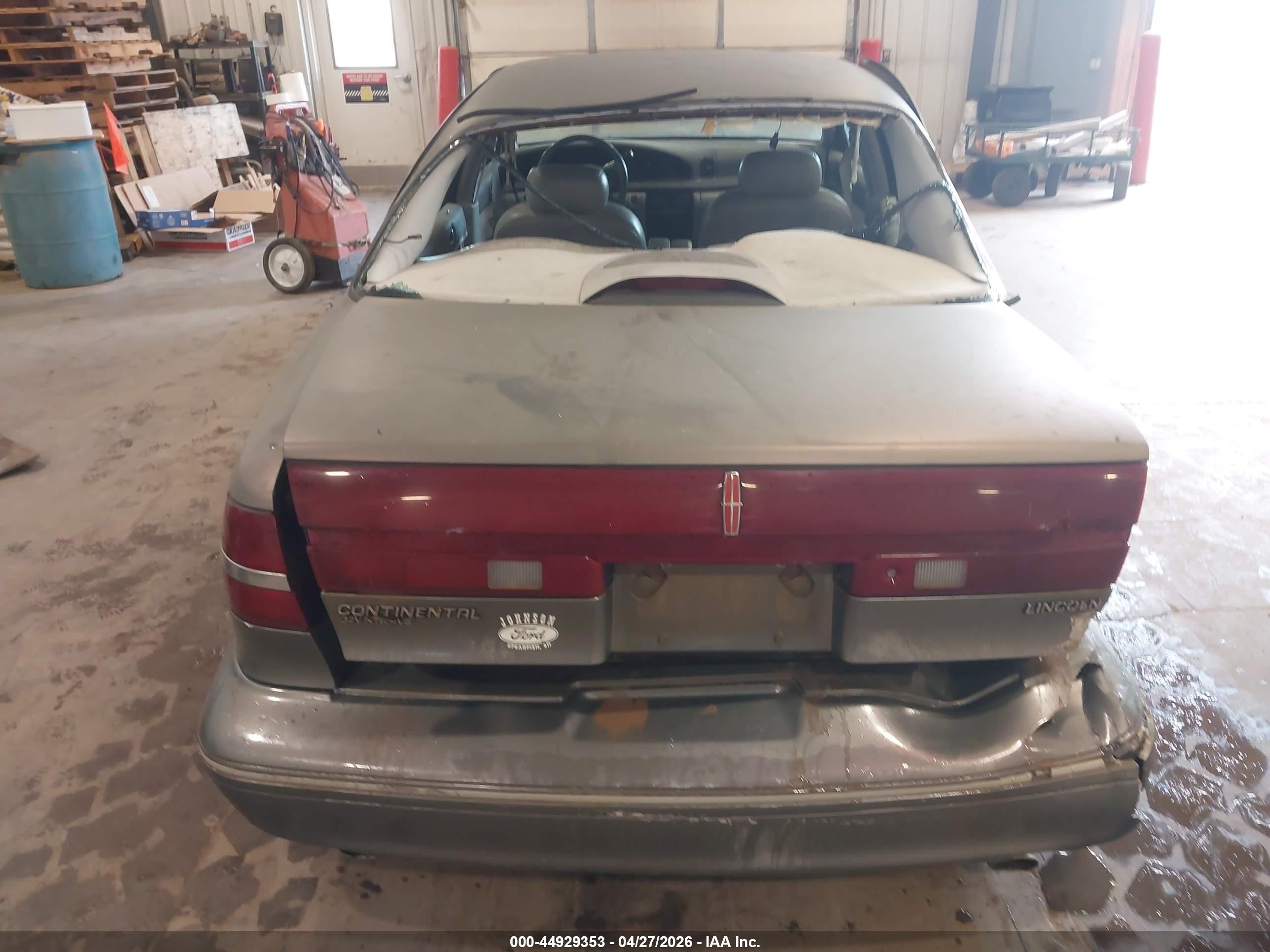 1997 Lincoln Continental Tan vin: 1LNLM97V3VY621809