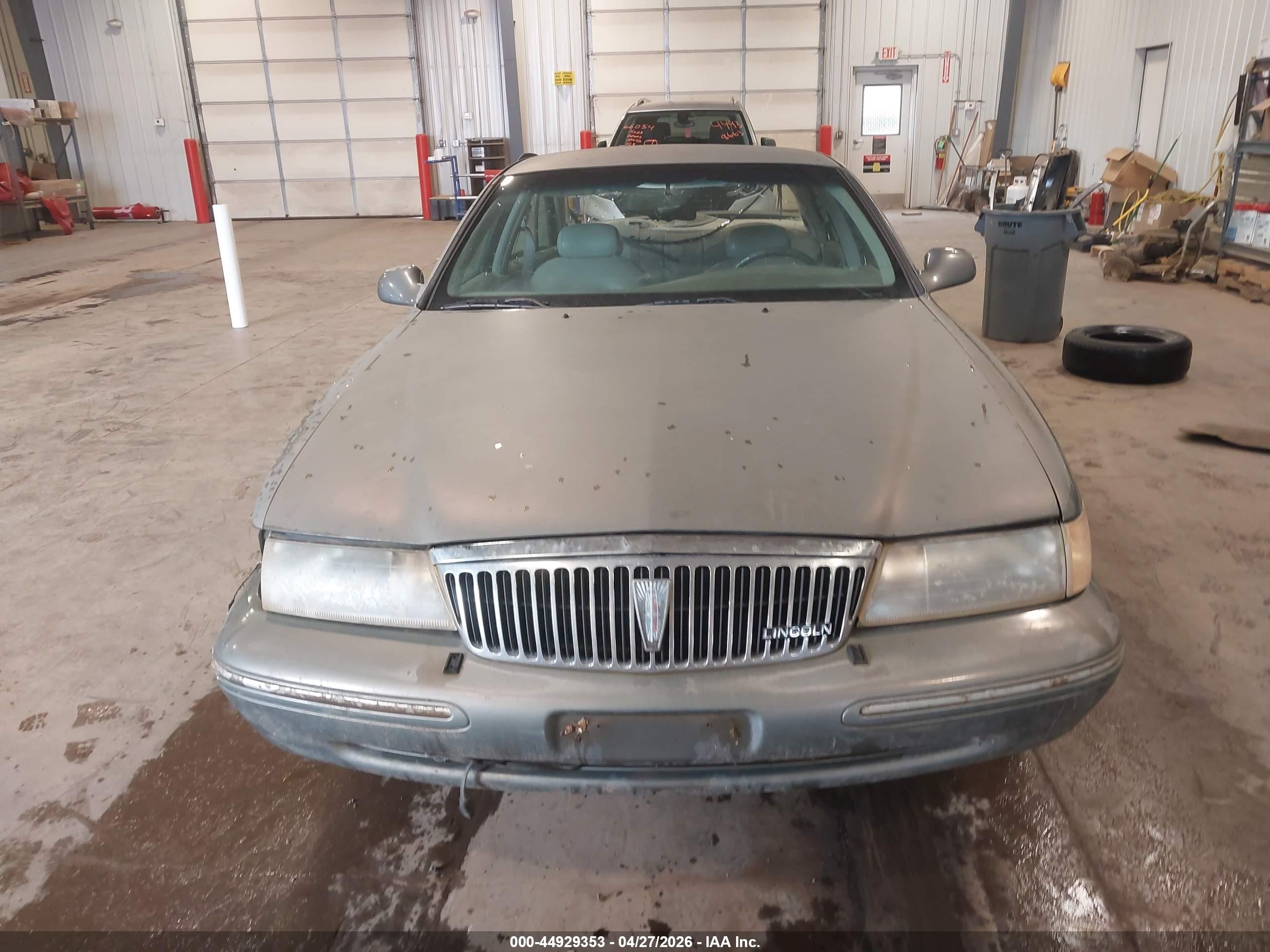 1997 Lincoln Continental Tan vin: 1LNLM97V3VY621809