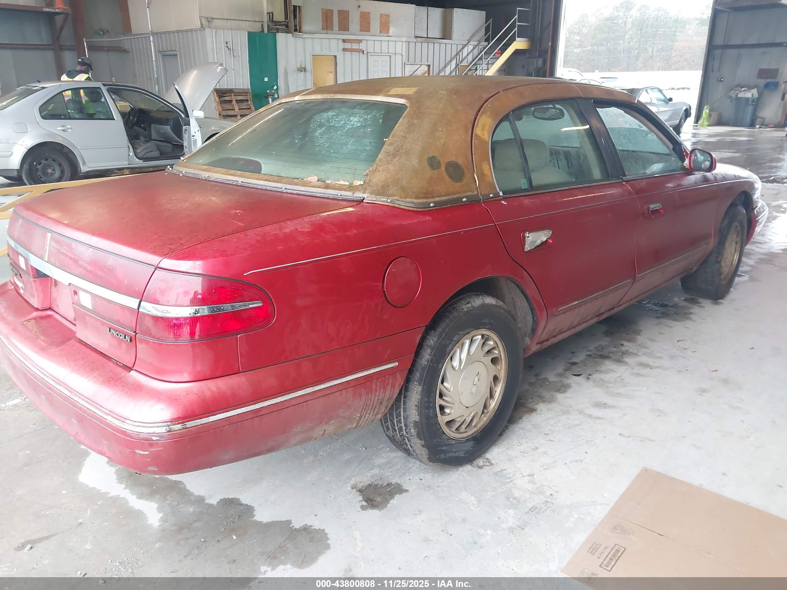 1997 Lincoln Continental   Red vin: 1LNLM97V3VY650906