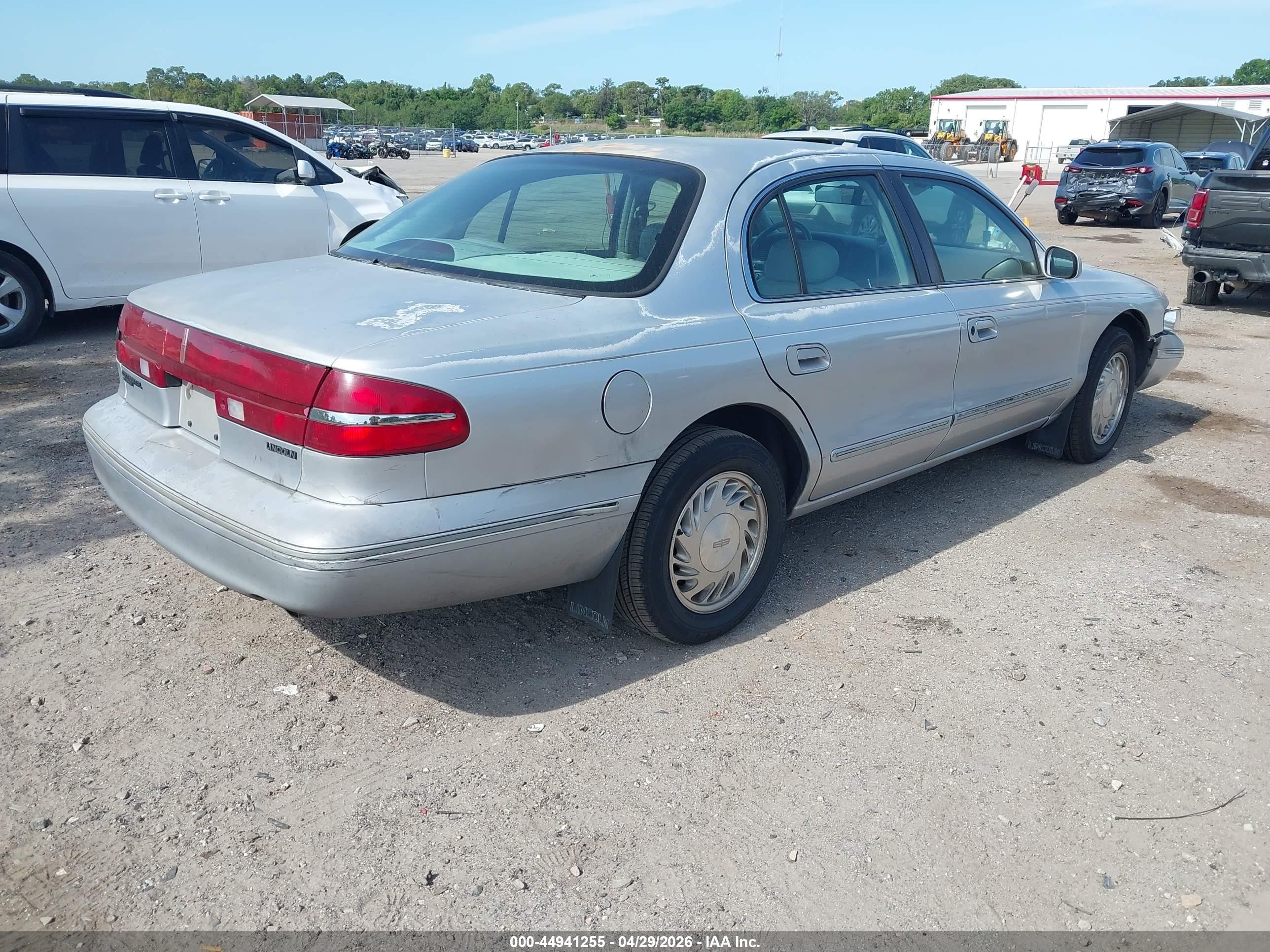 1996 Lincoln Continental Diamond Annive/spinnaker Silver vin: 1LNLM97V5TY702744