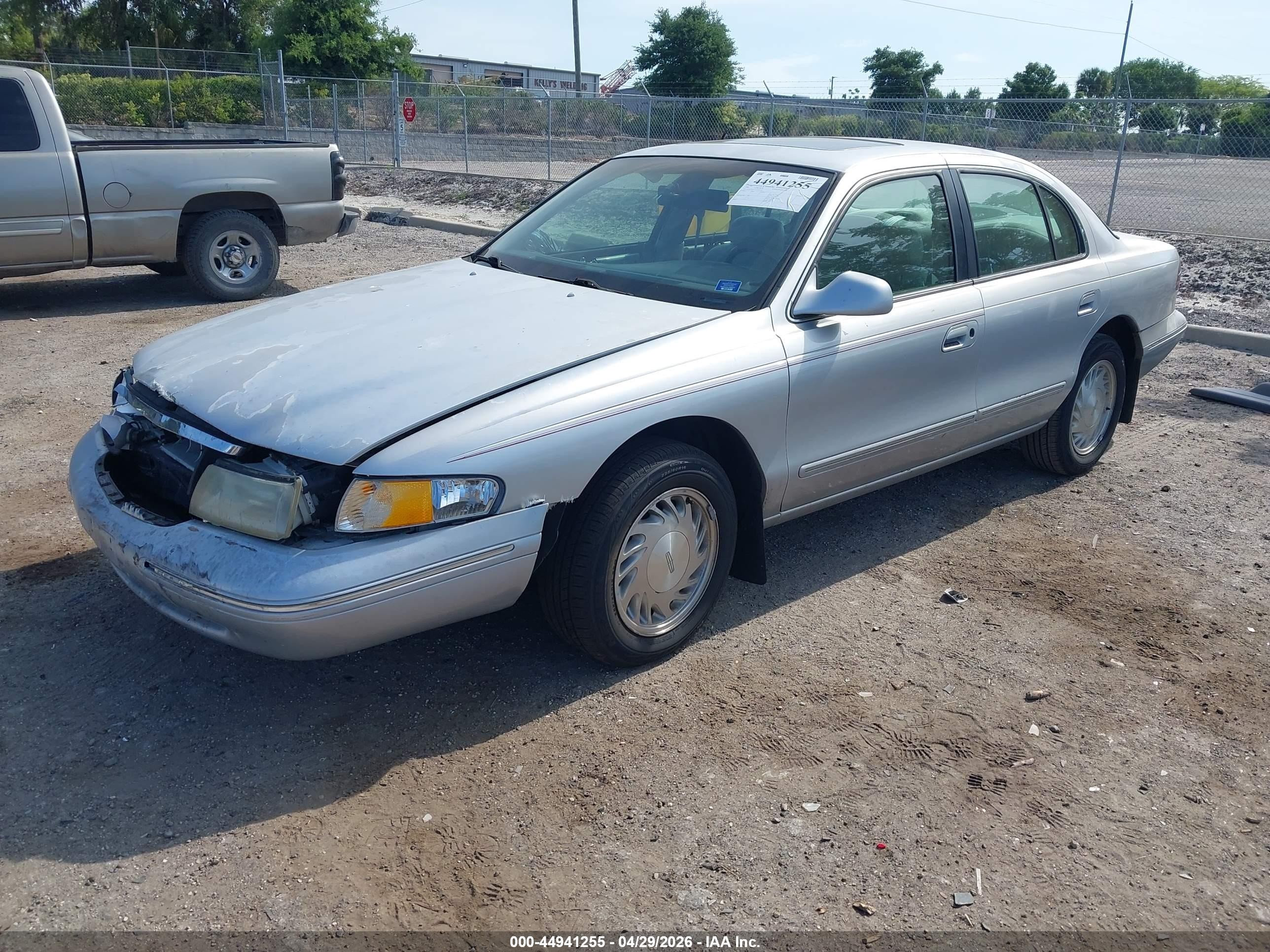 1996 Lincoln Continental Diamond Annive/spinnaker Silver vin: 1LNLM97V5TY702744