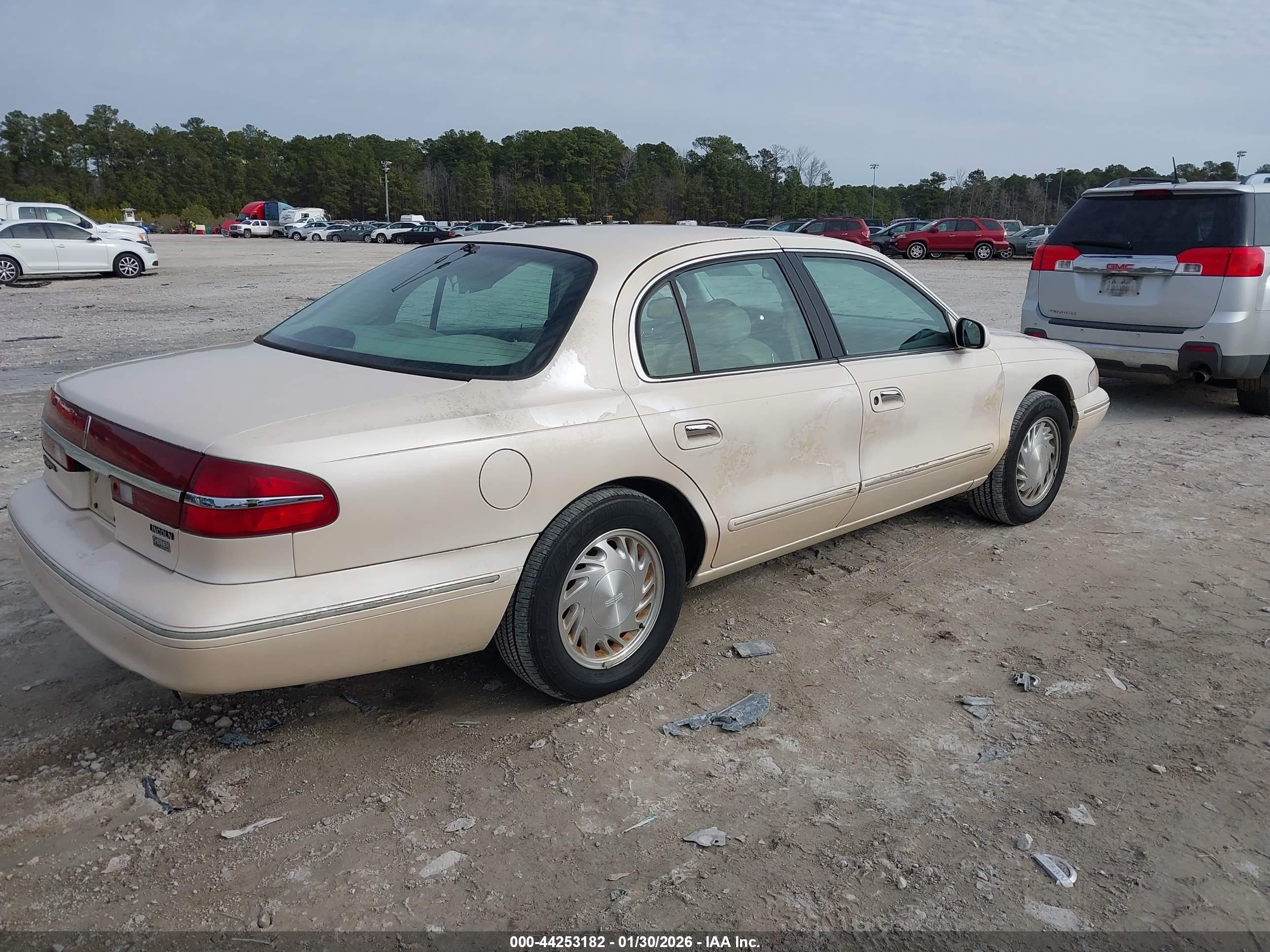 1997 Lincoln Continental   Tan vin: 1LNLM97V6VY708653