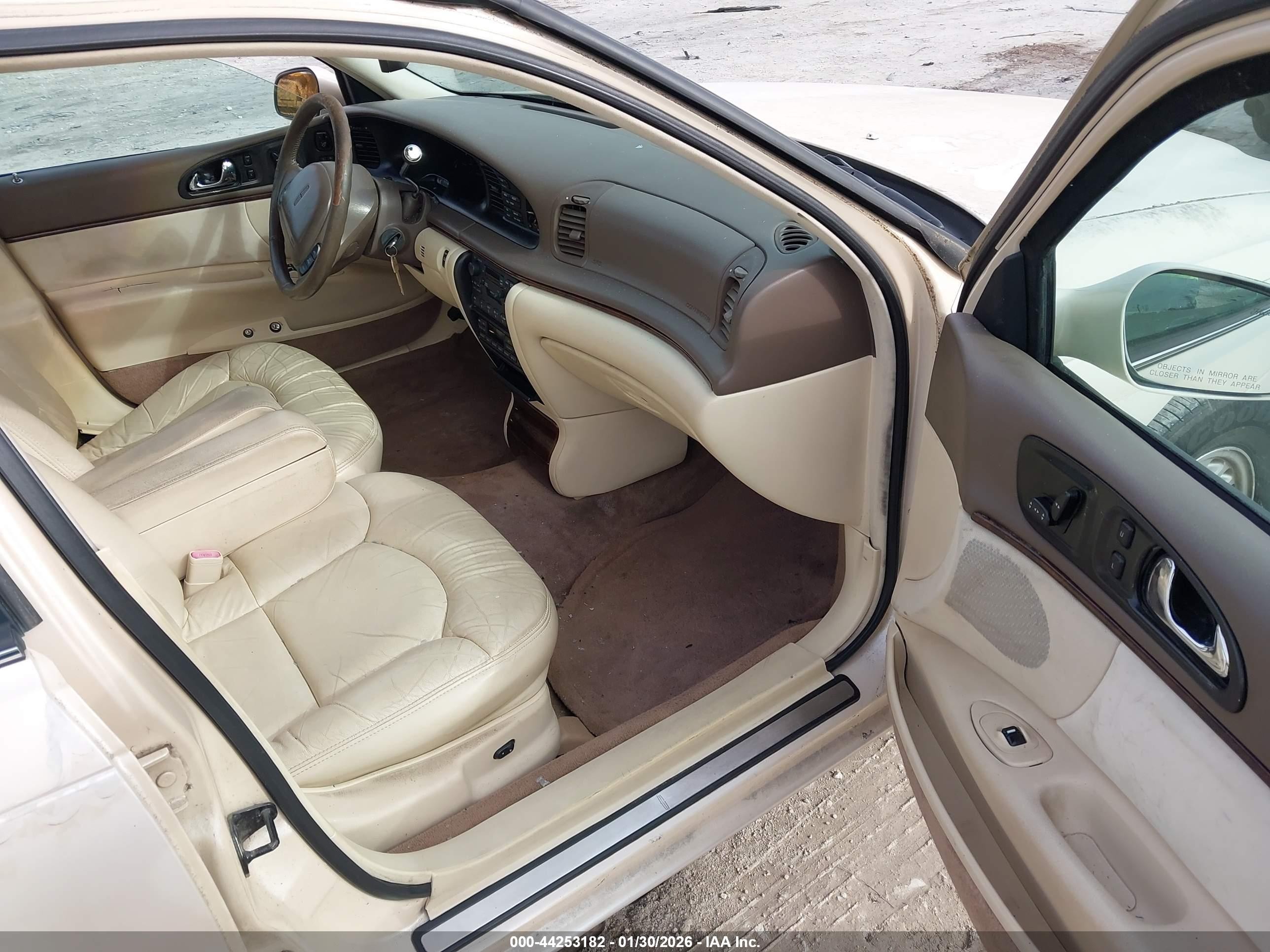 1997 Lincoln Continental   Tan vin: 1LNLM97V6VY708653