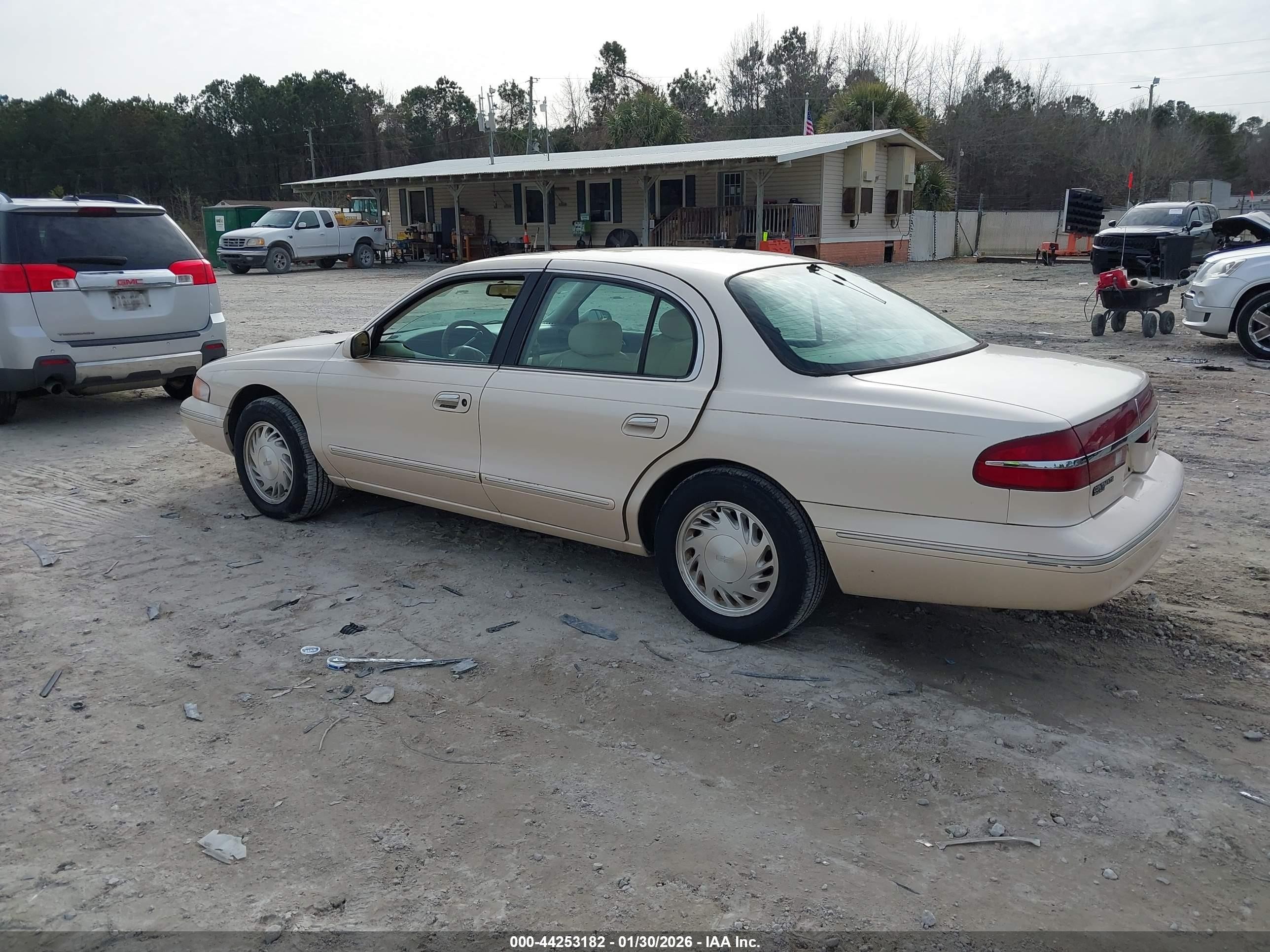 1997 Lincoln Continental   Tan vin: 1LNLM97V6VY708653