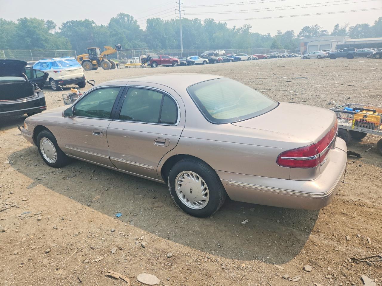 1995 Lincoln Continental Beige vin: 1LNLM97V7SY670037