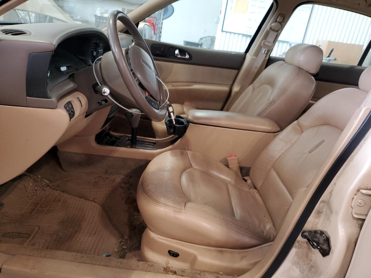 1997 Lincoln Continental Tan vin: 1LNLM97V7VY663898