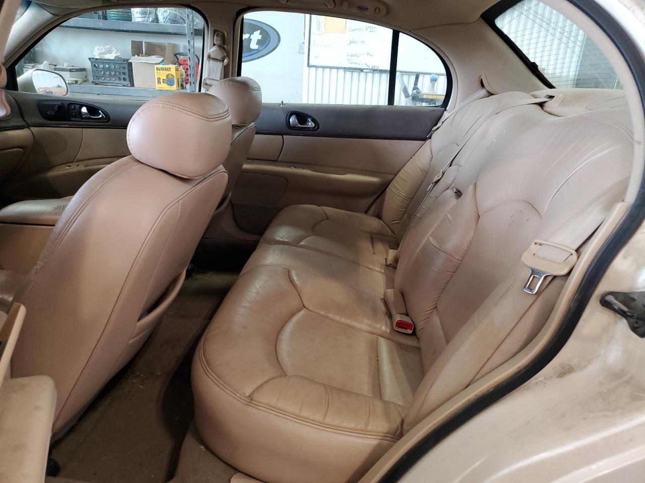 1997 Lincoln Continental Tan vin: 1LNLM97V7VY663898