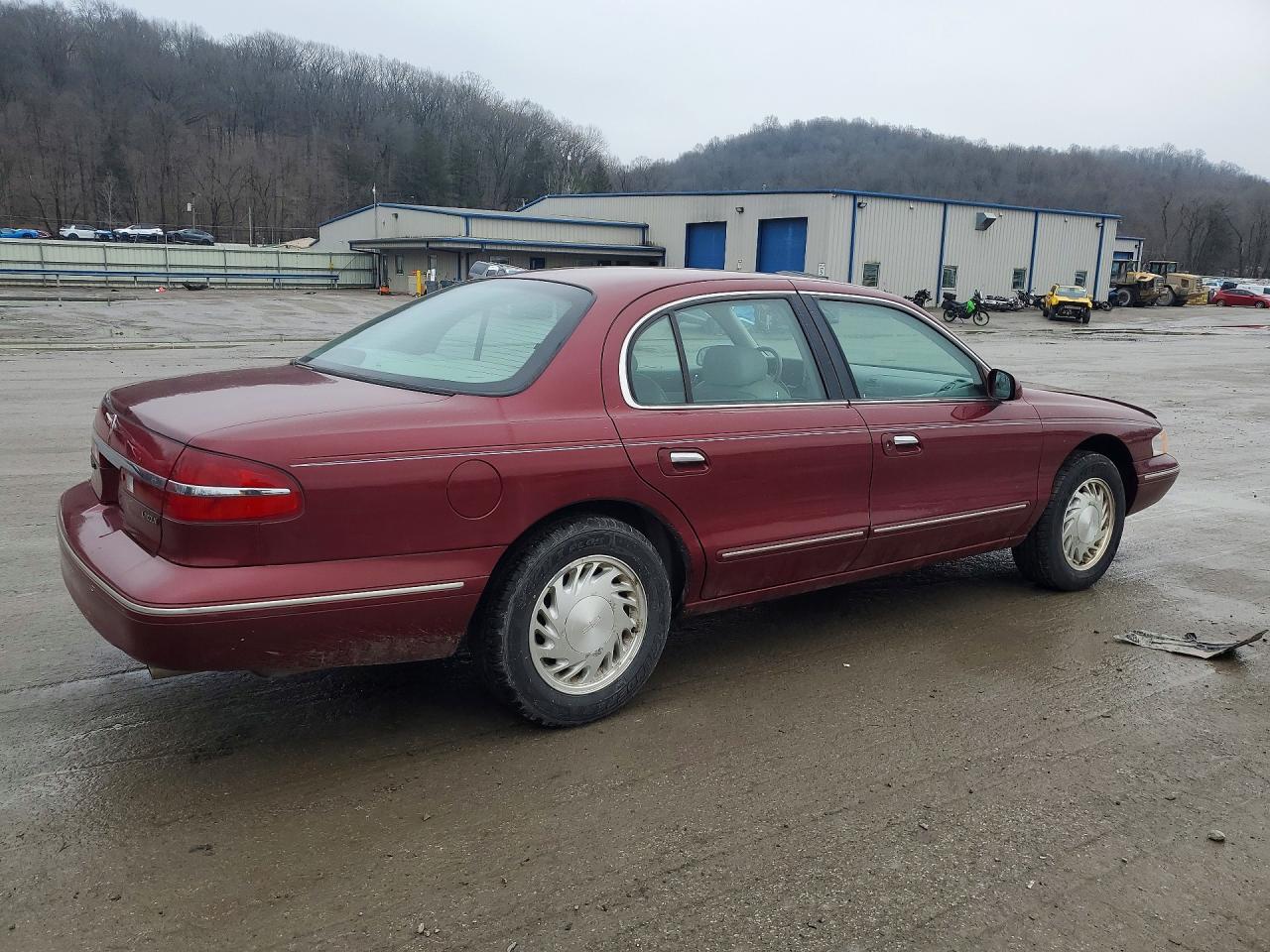 1997 Lincoln Continental Burgundy vin: 1LNLM97V7VY679714