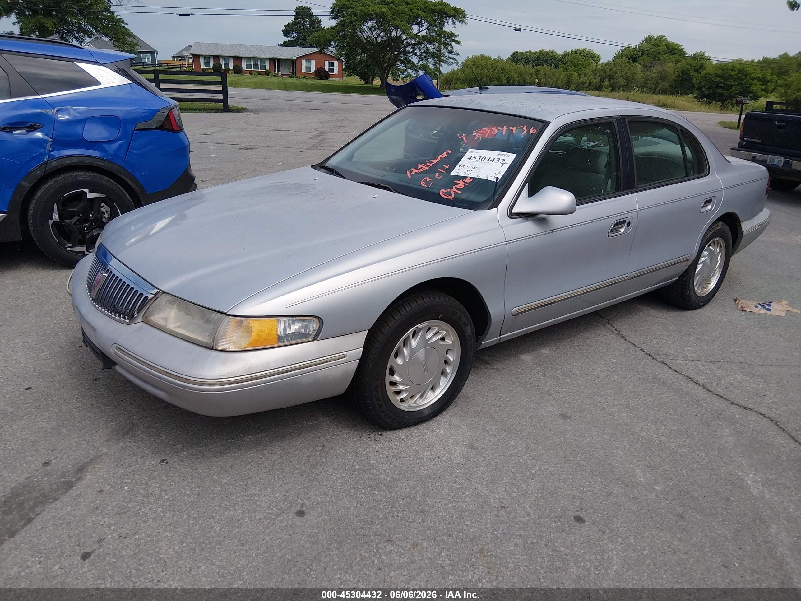 1997 Lincoln Continental   Серебряный vin: 1LNLM97V9VY619997
