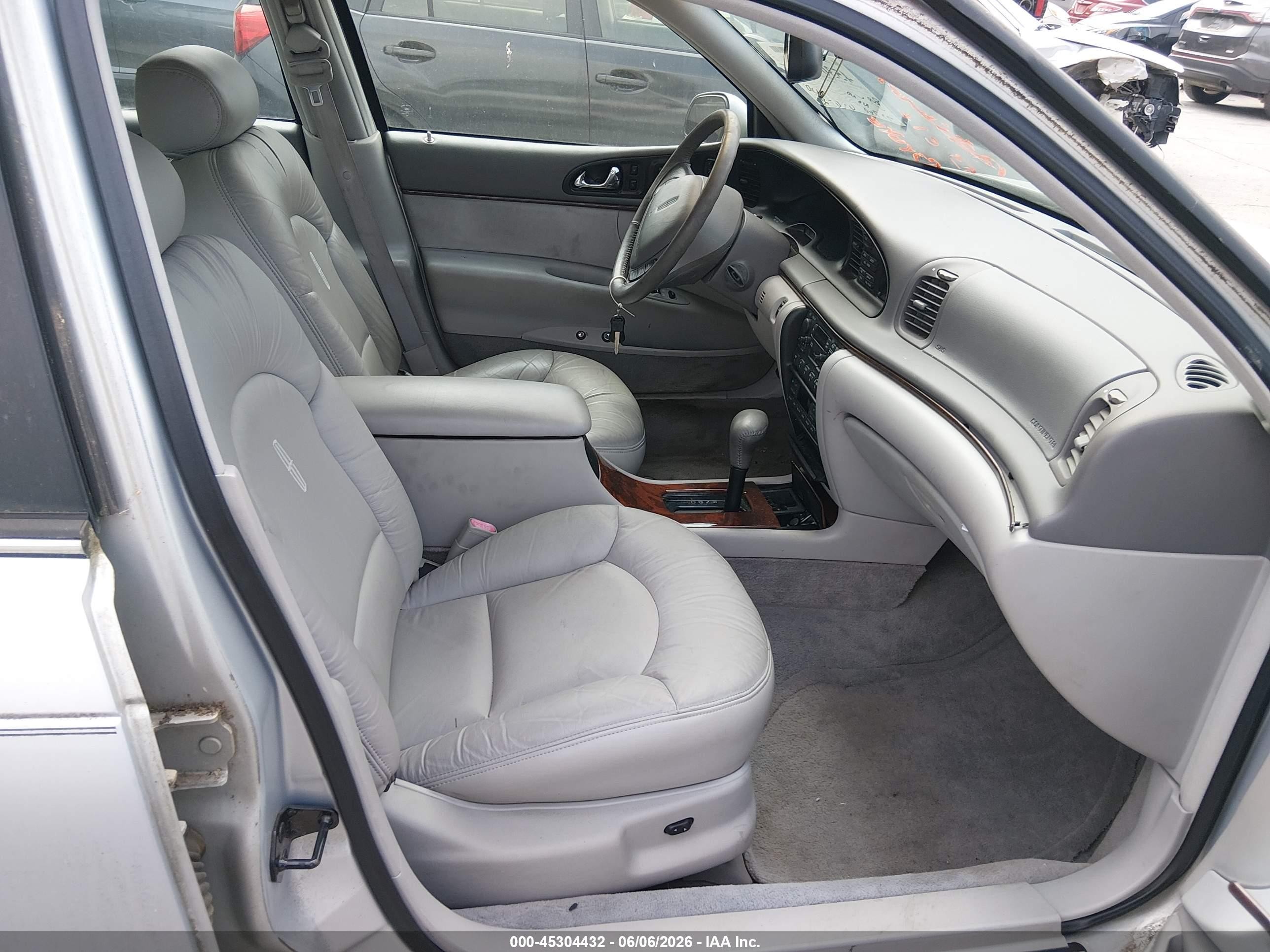 1997 Lincoln Continental   Серебряный vin: 1LNLM97V9VY619997