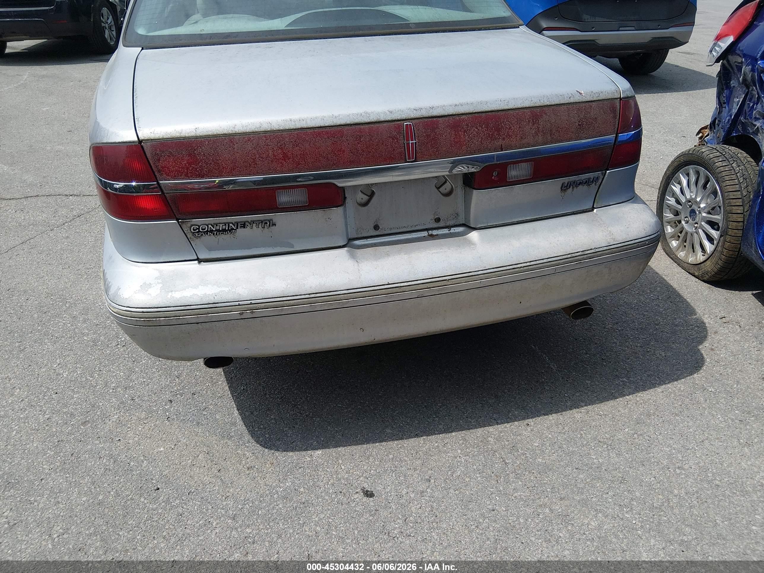 1997 Lincoln Continental   Серебряный vin: 1LNLM97V9VY619997