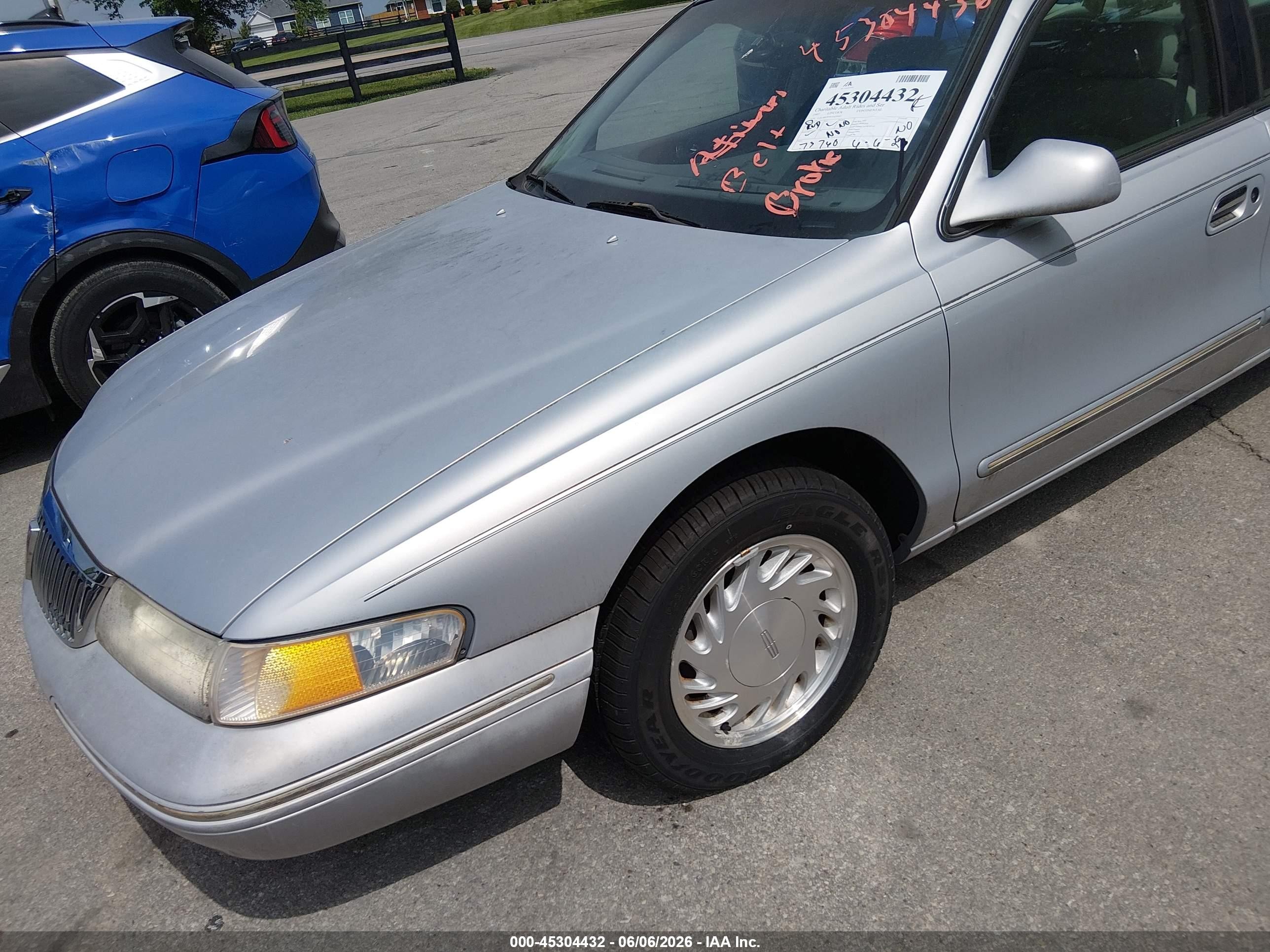 1997 Lincoln Continental   Серебряный vin: 1LNLM97V9VY619997