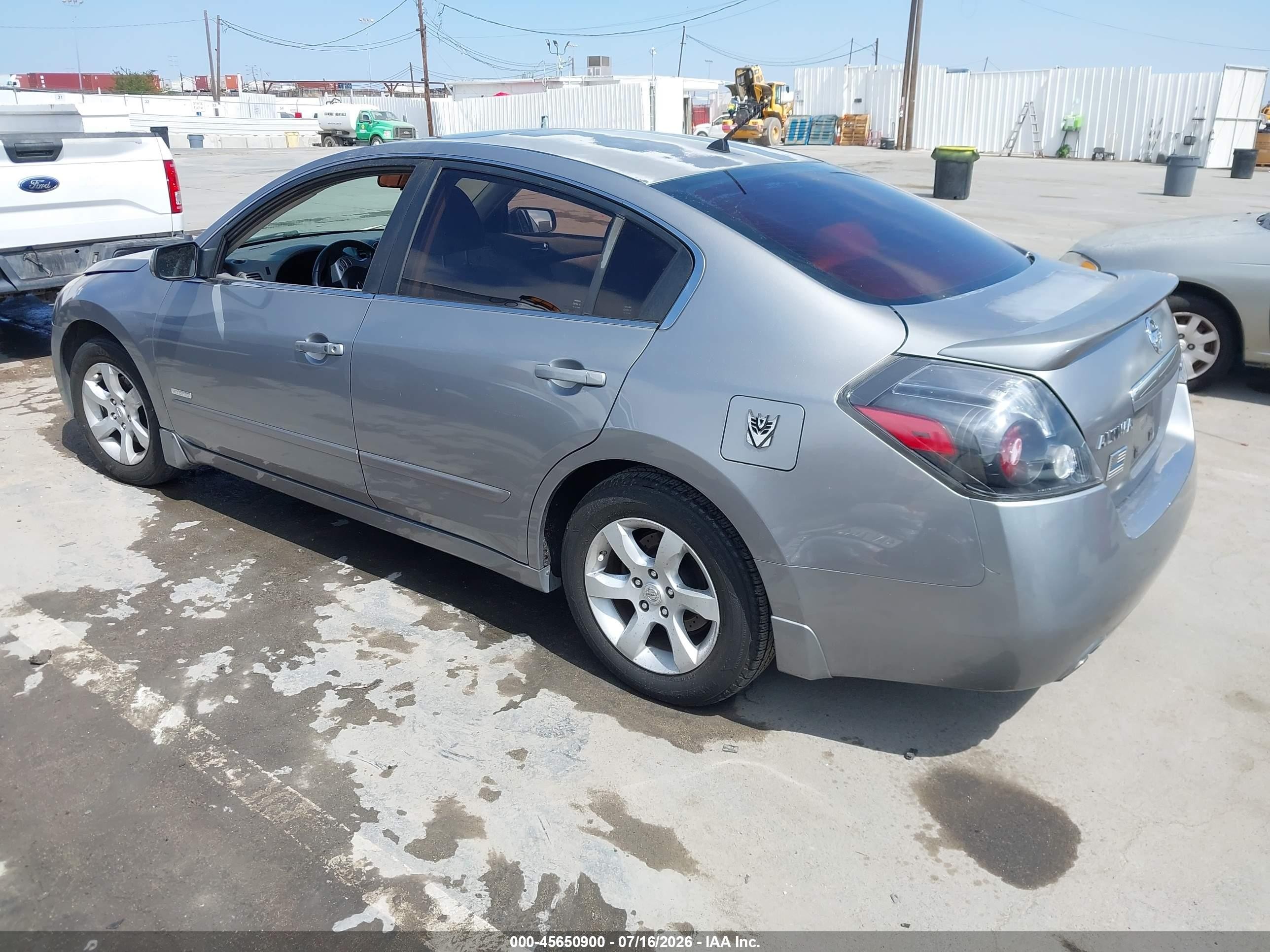 2007 Nissan Altima Hybrid   Silver vin: 1M4CL21E47C219682