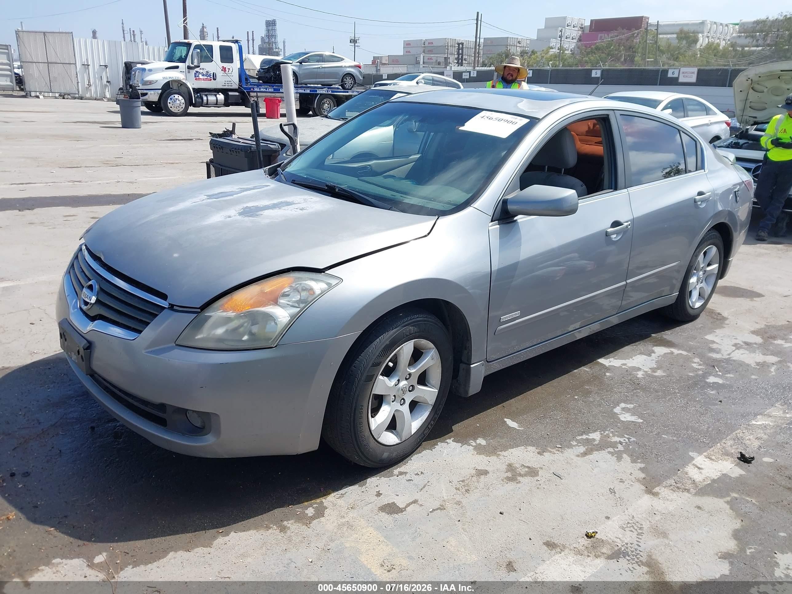 2007 Nissan Altima Hybrid   Silver vin: 1M4CL21E47C219682