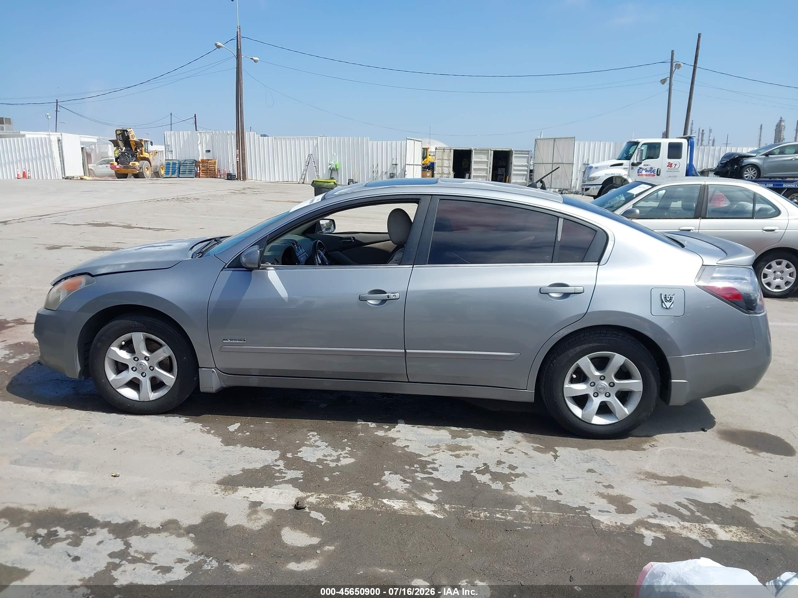 2007 Nissan Altima Hybrid   Silver vin: 1M4CL21E47C219682